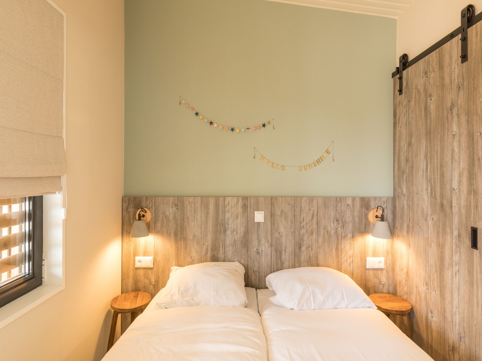 Een slaapkamer van Sea Lodges Ameland 3 in Hollum