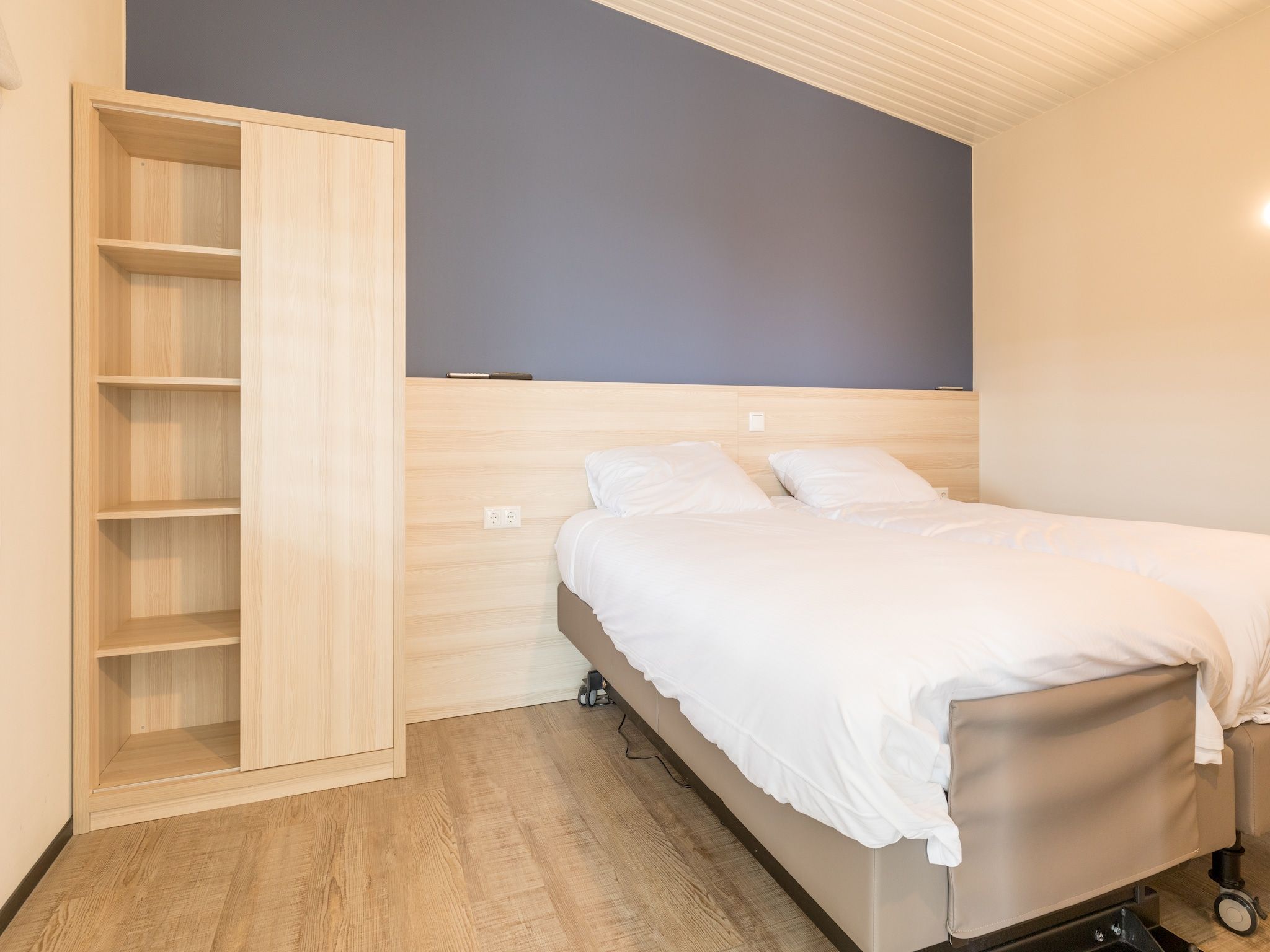 Een slaapkamer van Sea Lodges Ameland 4 in Hollum