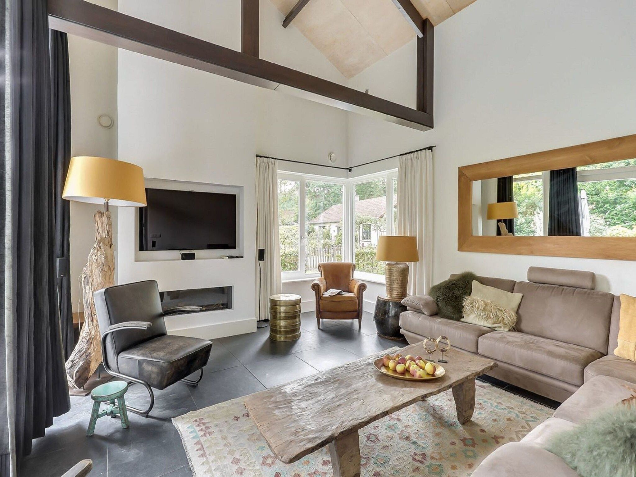 De woonkamer van Vakantiepark Sandberghe 7 in Uden