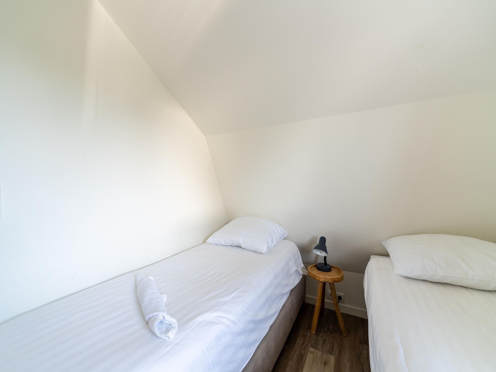 Een slaapkamer van Waterland in Egmond aan den Hoef