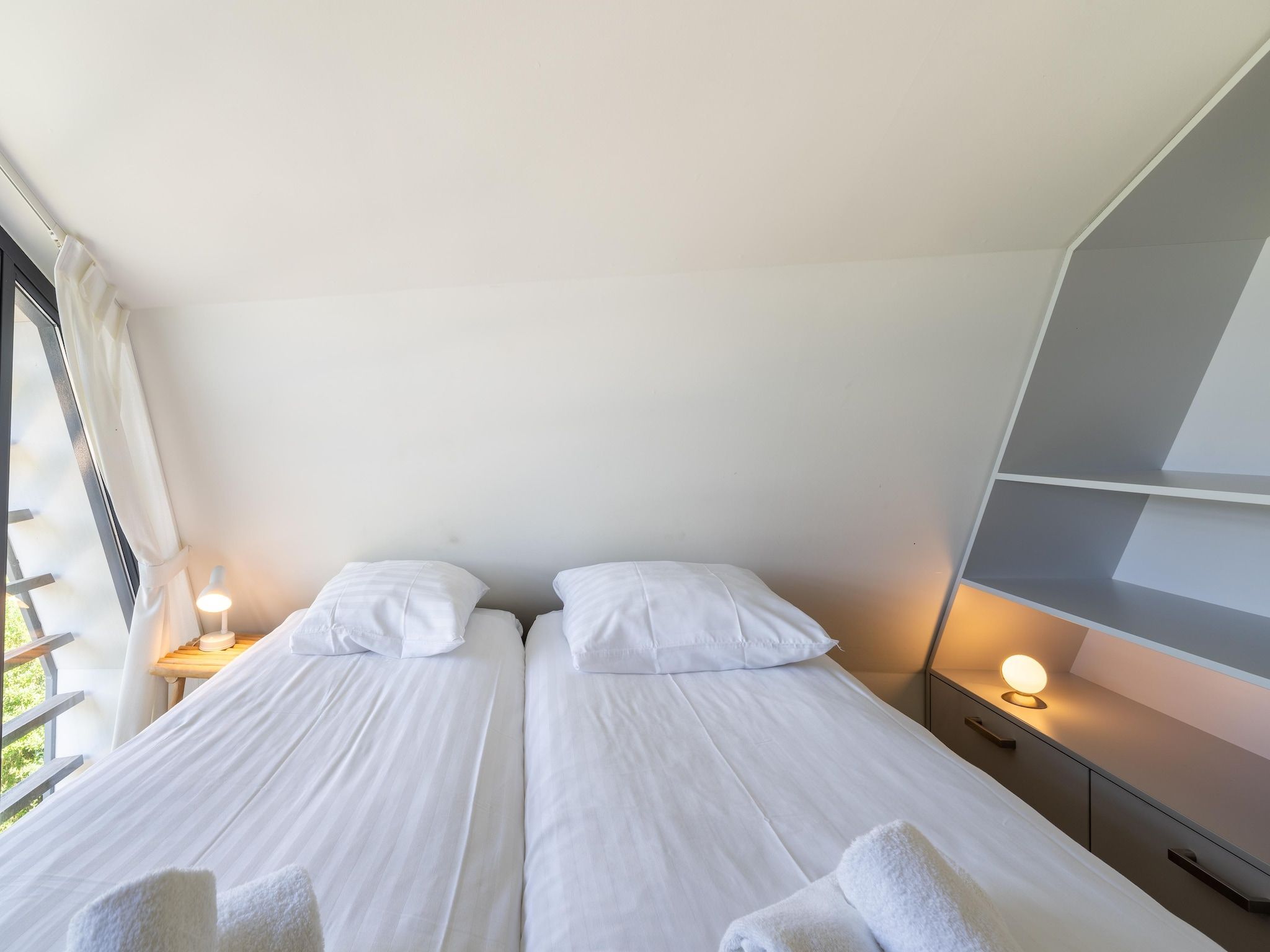 Een slaapkamer van Waterland in Egmond aan den Hoef