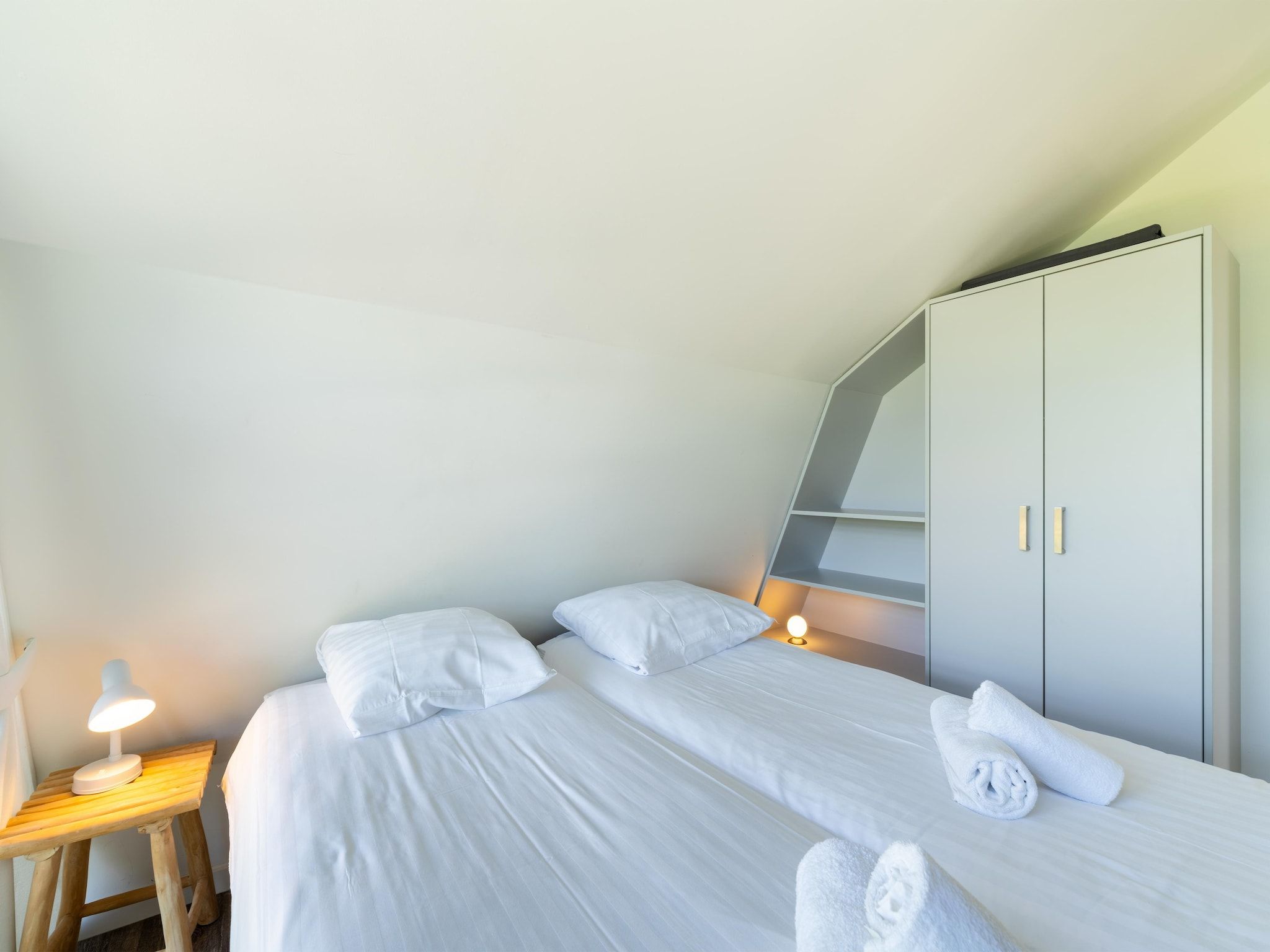 Een slaapkamer van Waterland in Egmond aan den Hoef