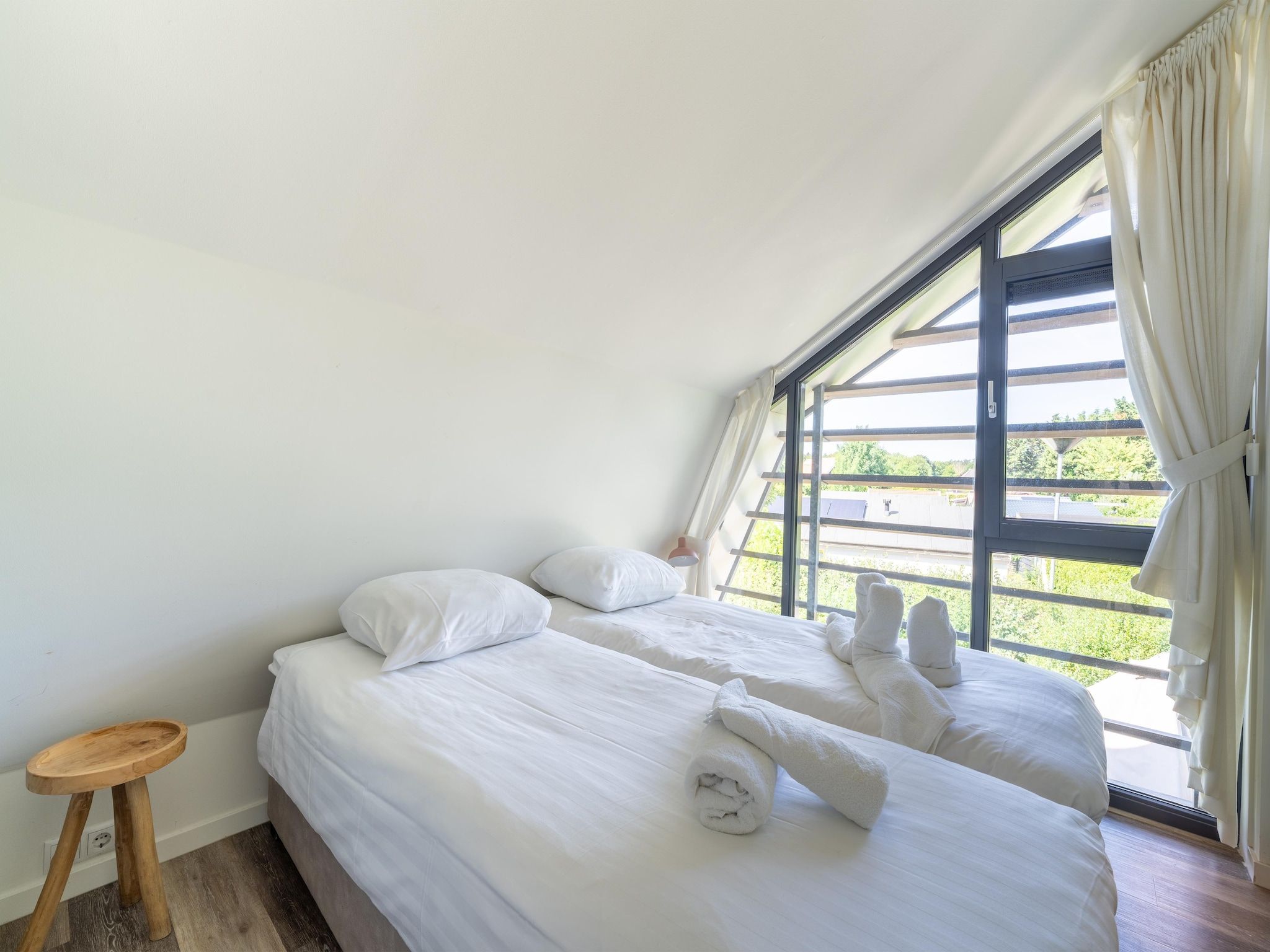 Een slaapkamer van Waterland in Egmond aan den Hoef