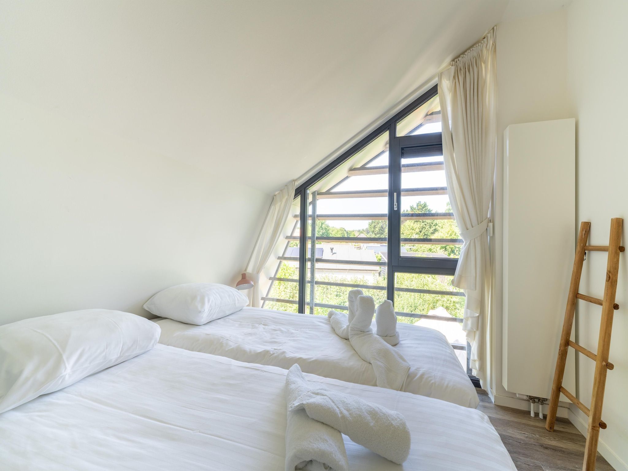 Een slaapkamer van Waterland in Egmond aan den Hoef