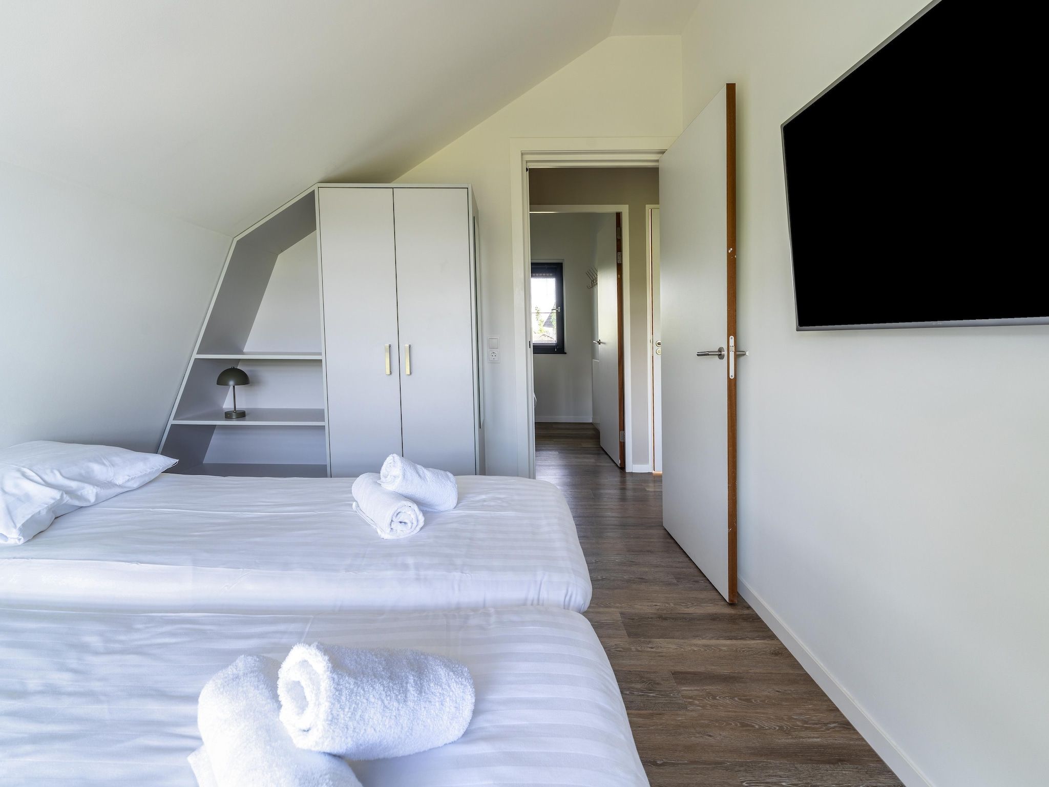 Een slaapkamer van Onder de molen in Egmond aan den Hoef