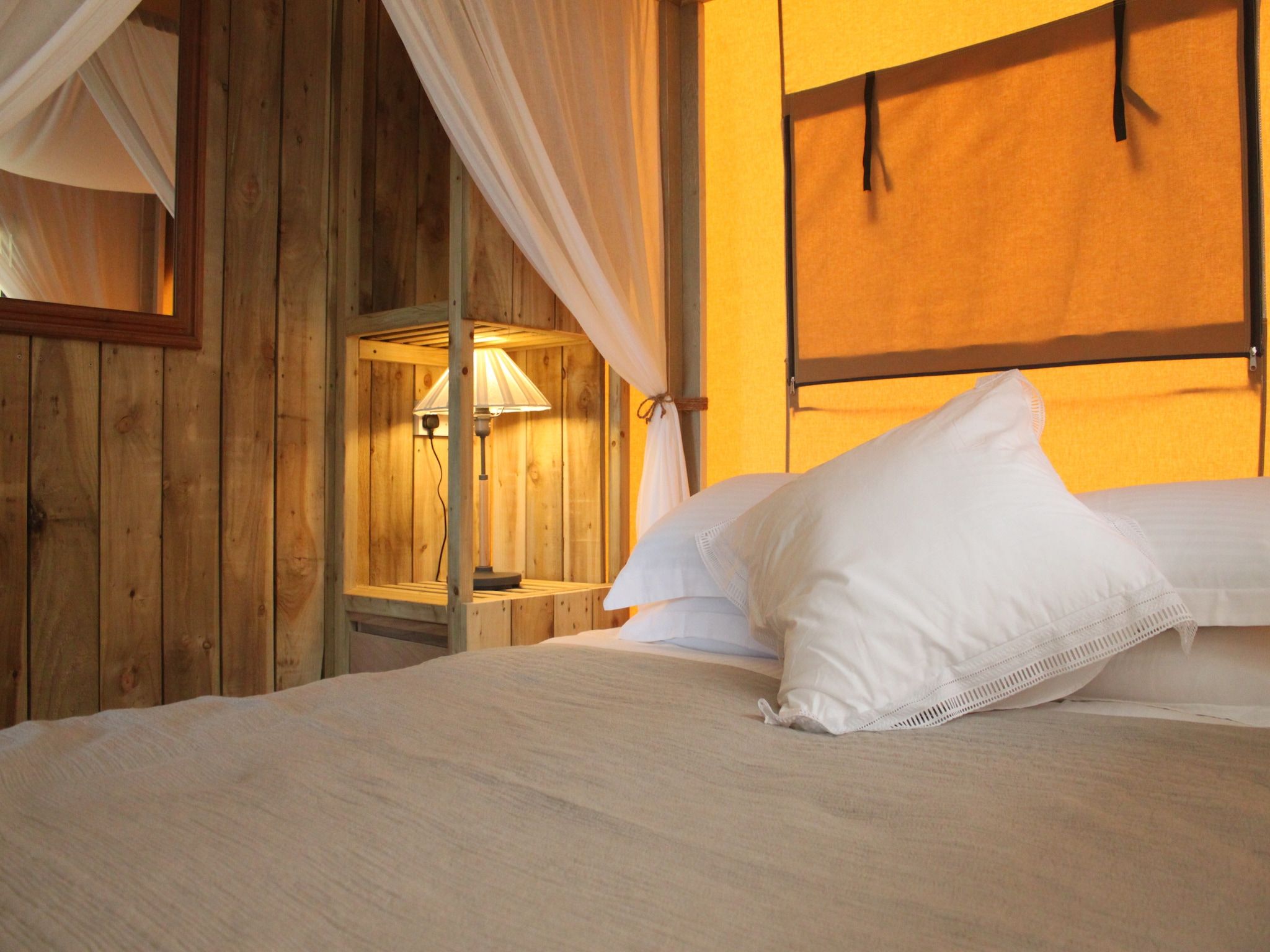 Een slaapkamer van Recreatiepark de Boshoek 2 in Voorthuizen