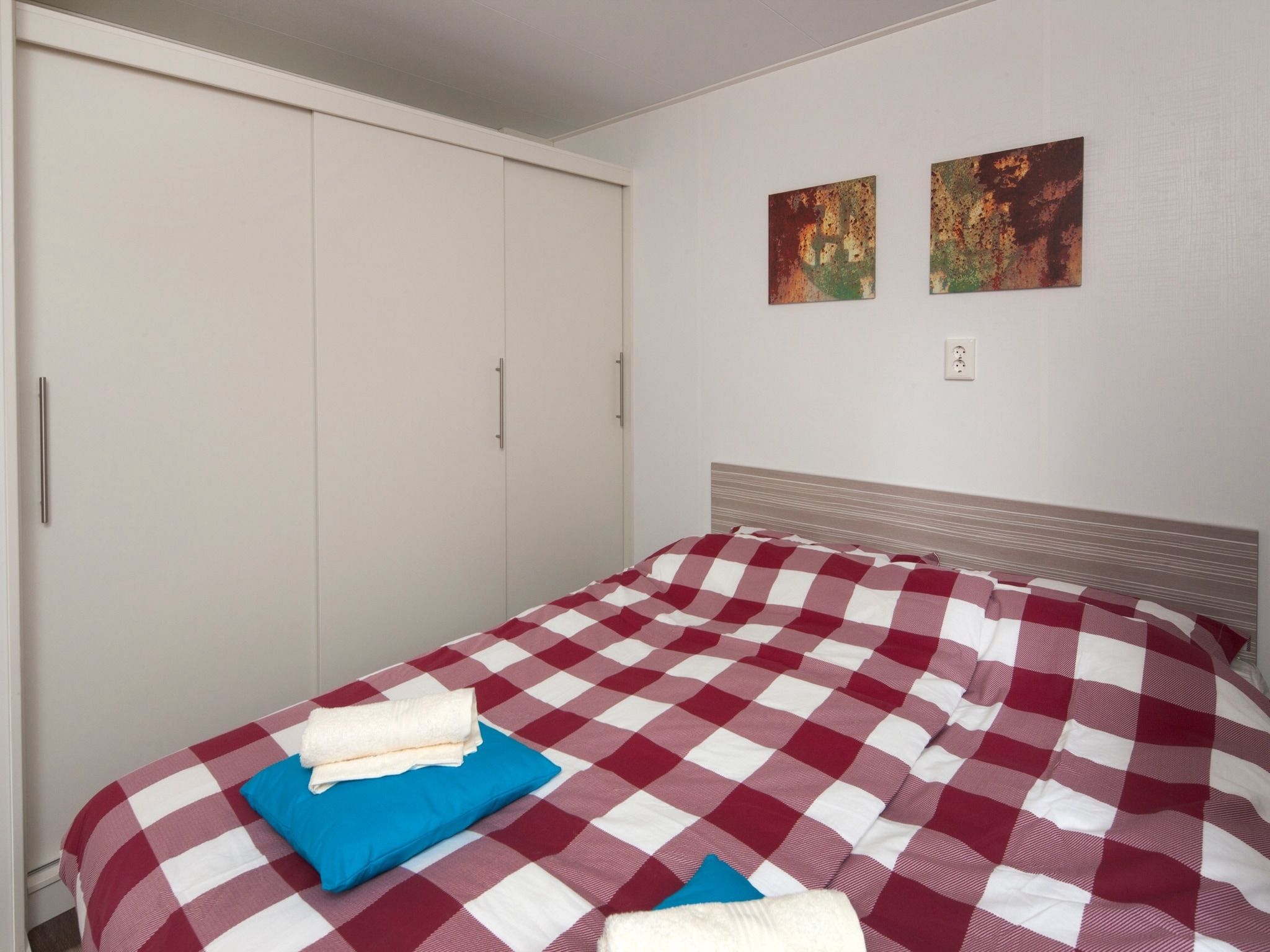 Een slaapkamer van Recreatiepark de Boshoek 4 in Voorthuizen