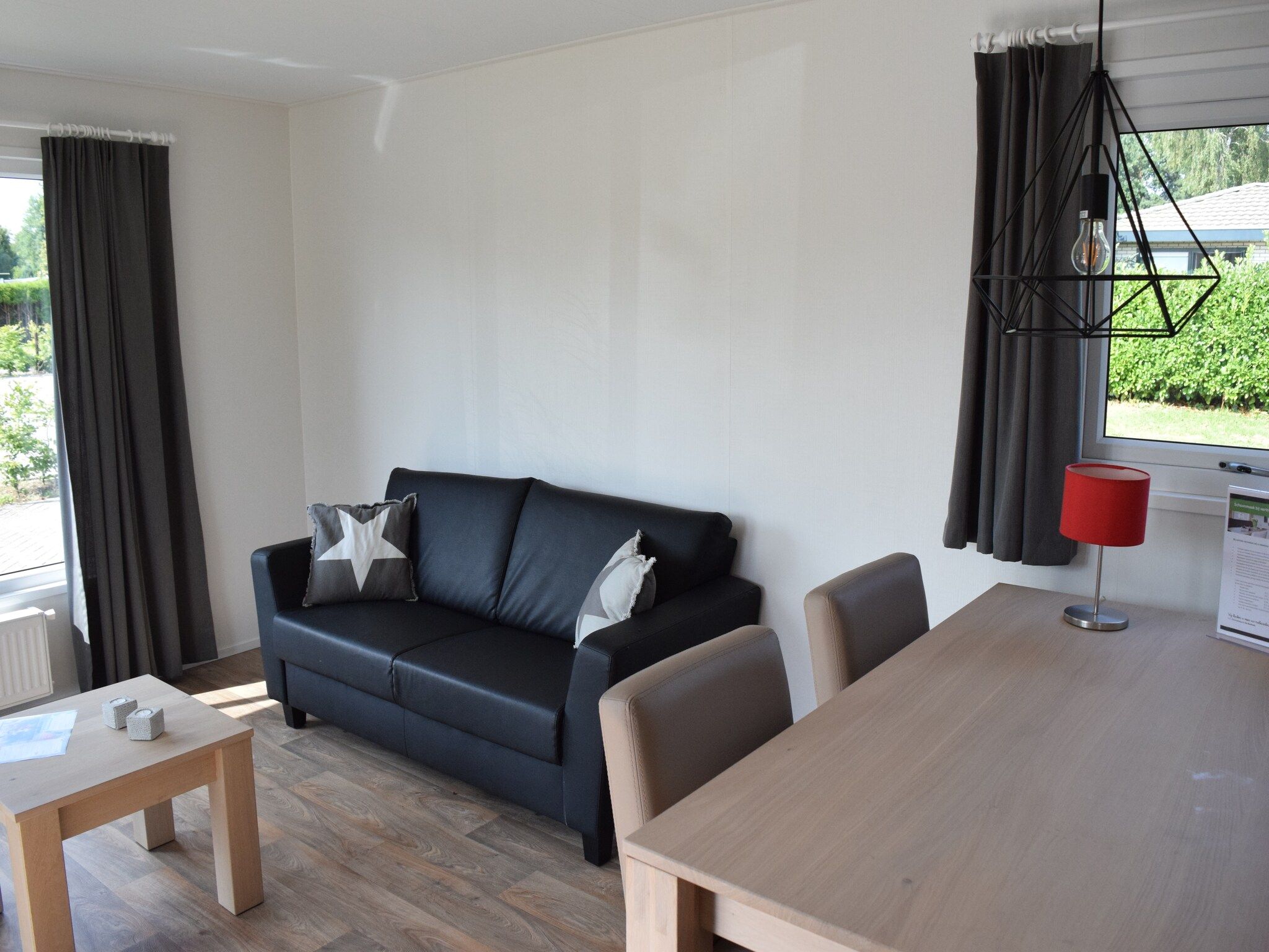 De woonkamer van Recreatiepark de Boshoek 4 in Voorthuizen