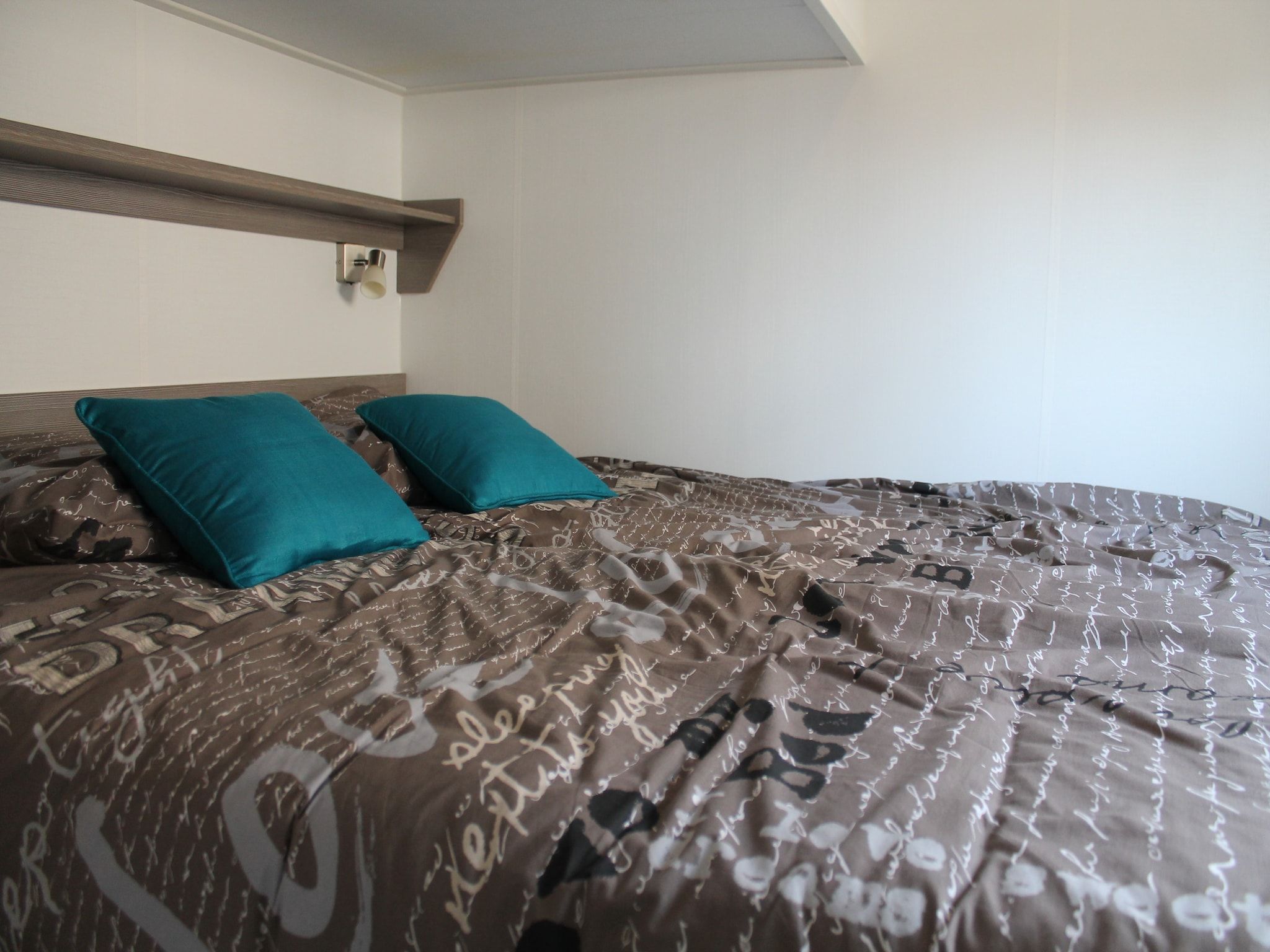 Een slaapkamer van Recreatiepark de Boshoek 7 in Voorthuizen