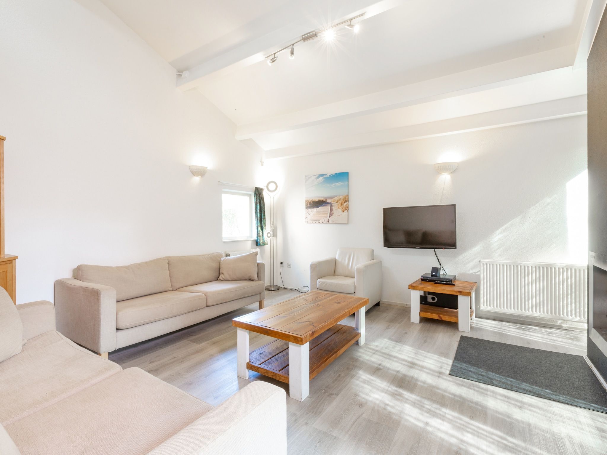 De woonkamer van Vakantiepark Kijkduin 7 in Den Haag