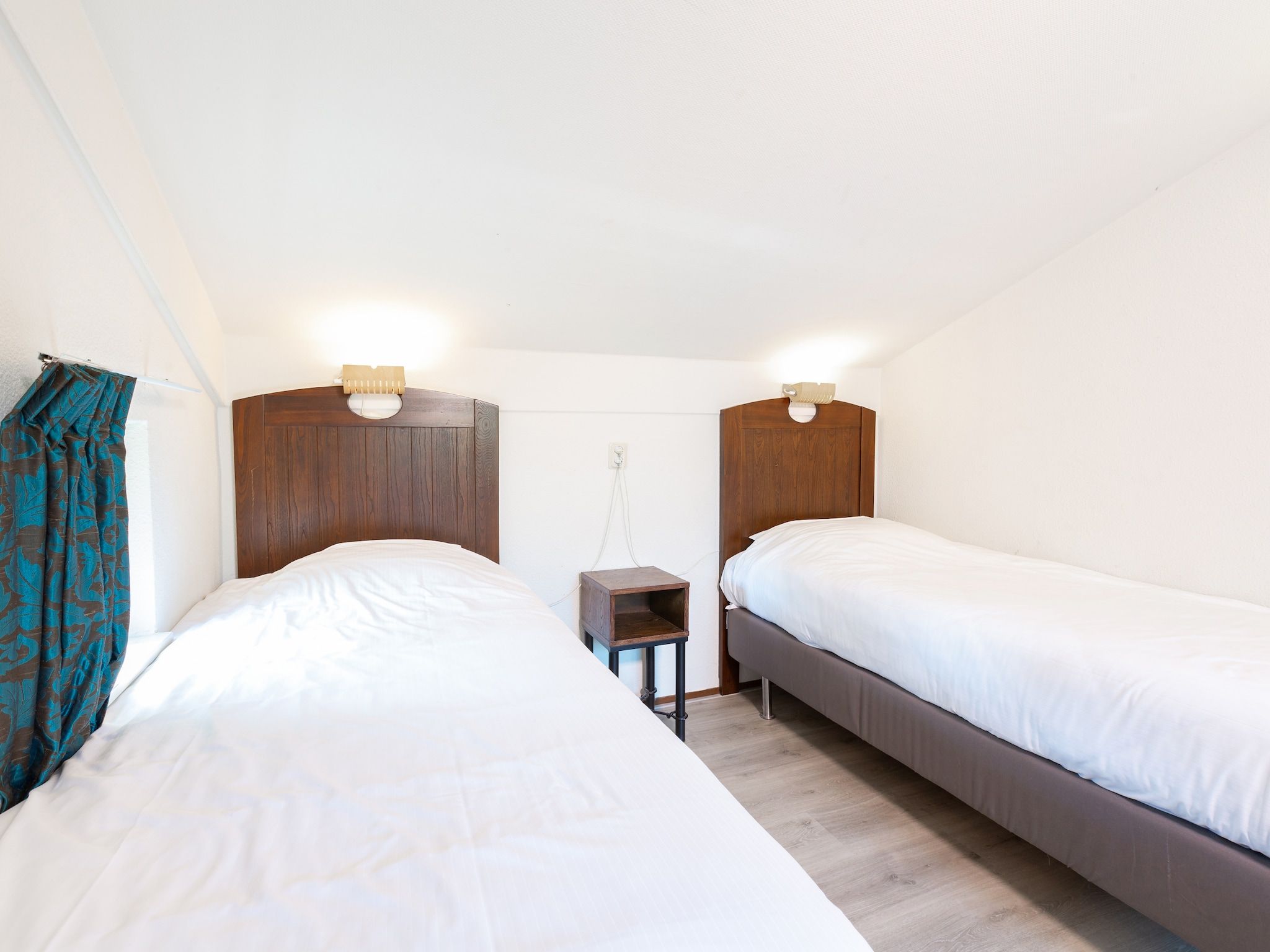 Een slaapkamer van Vakantiepark Kijkduin 7 in Den Haag