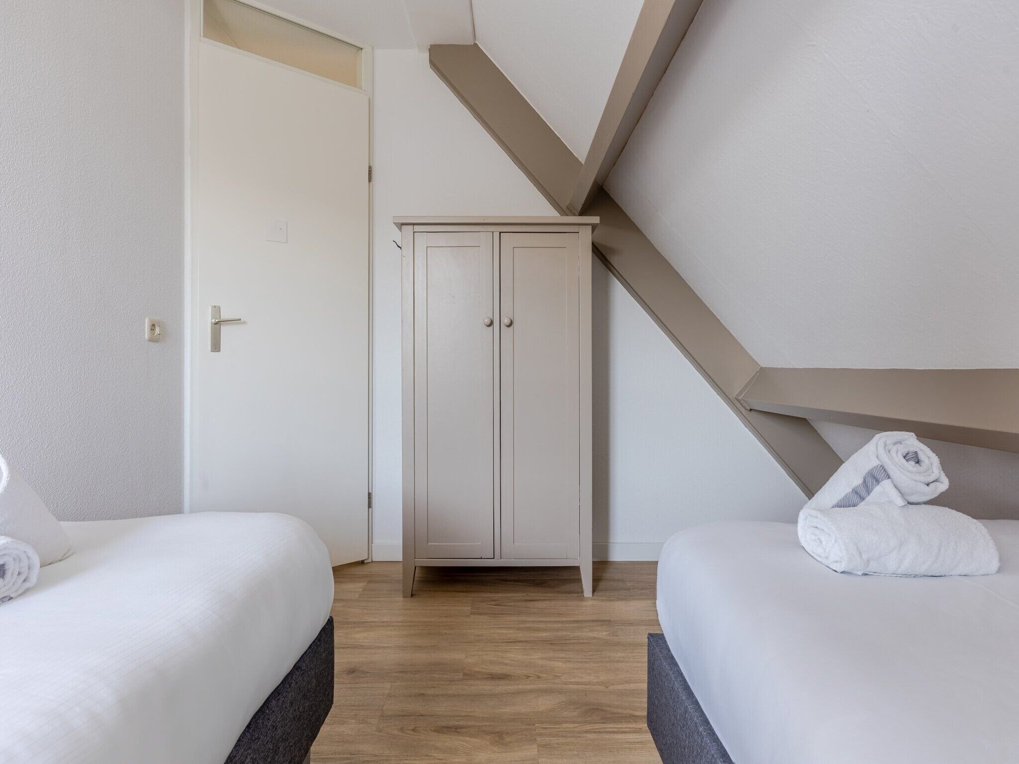 Een slaapkamer van Buitenhof Domburg 12 in Domburg