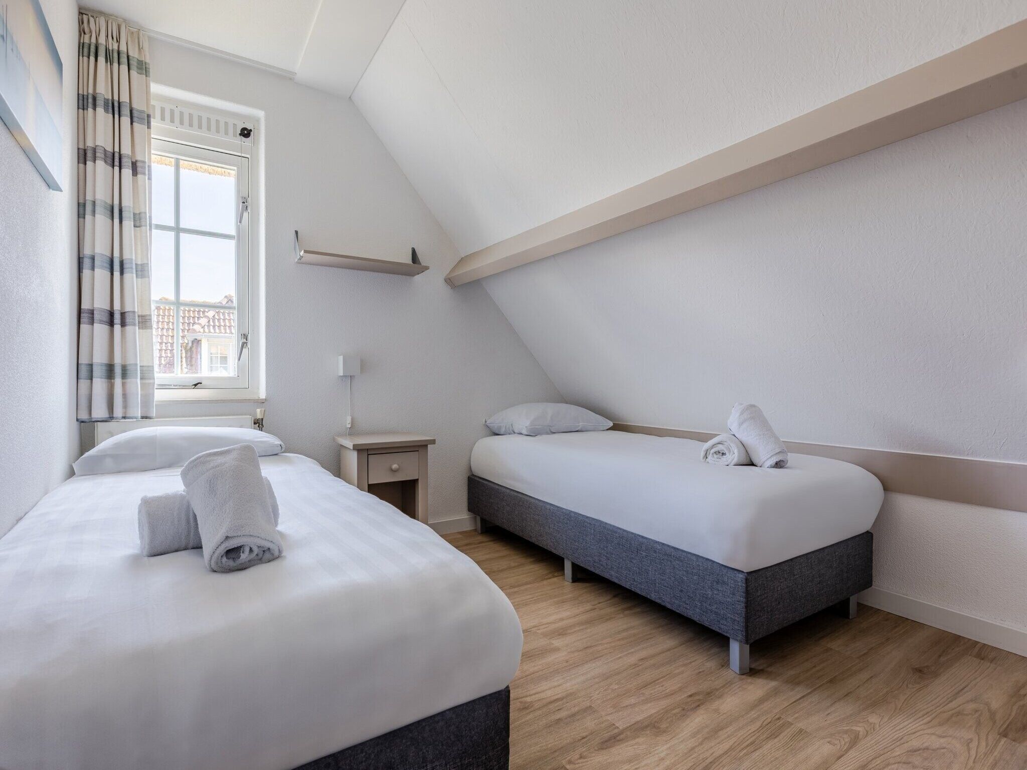 Een slaapkamer van Buitenhof Domburg 12 in Domburg