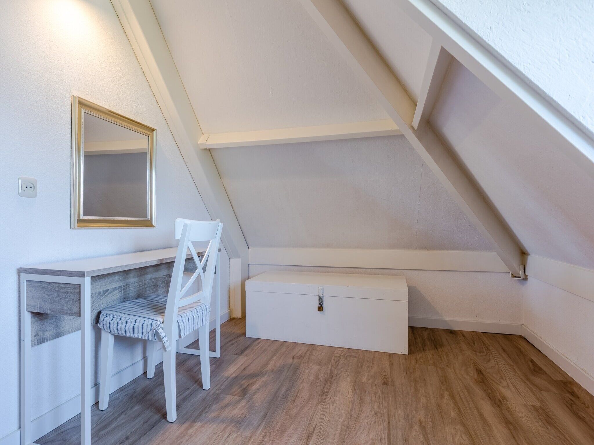 Een slaapkamer van Buitenhof Domburg 12 in Domburg