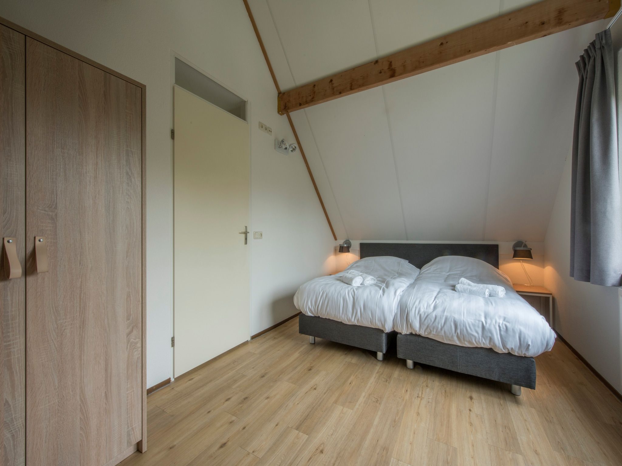 Een slaapkamer van Buitenhof Domburg 11 in Domburg