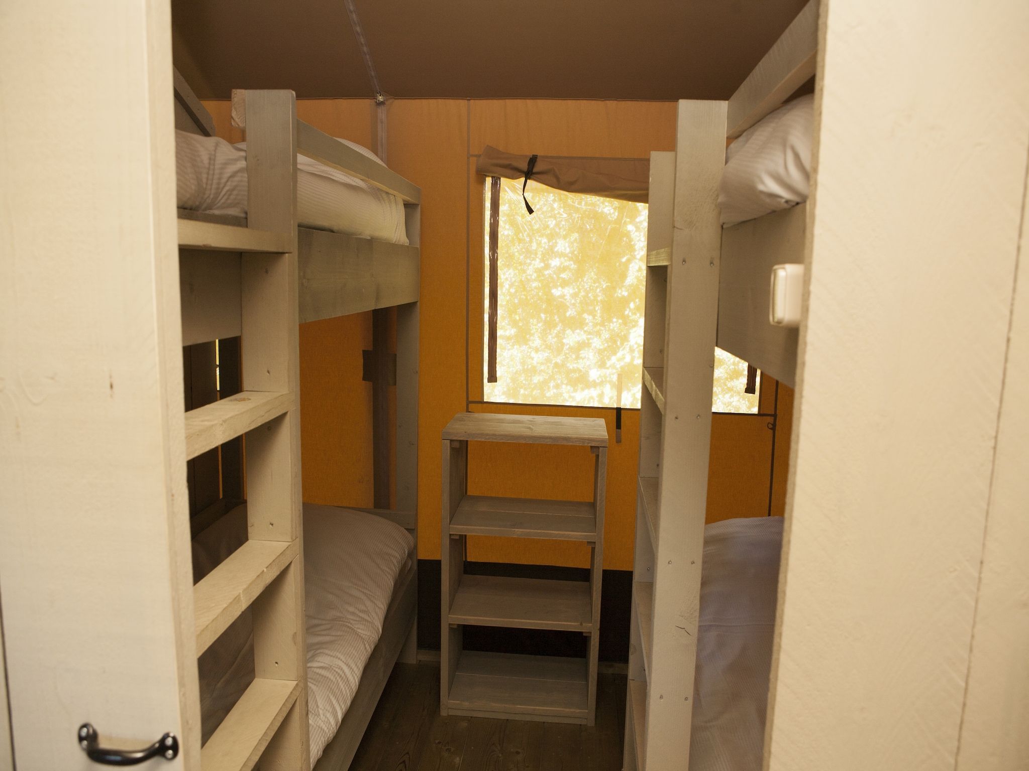 Een slaapkamer van Recreatiepark de Boshoek 19 in Voorthuizen