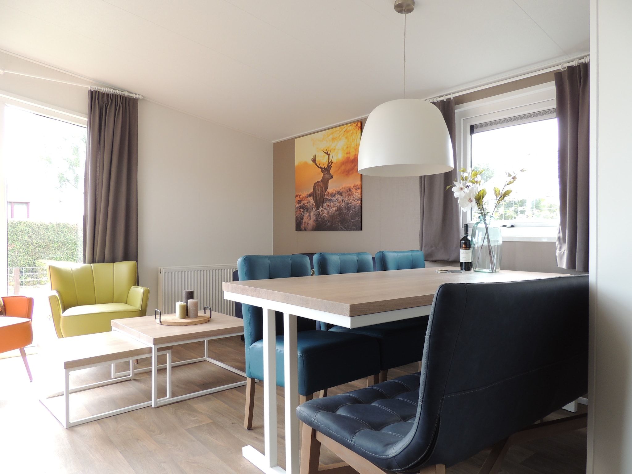 De woonkamer van Recreatiepark de Boshoek 20 in Voorthuizen