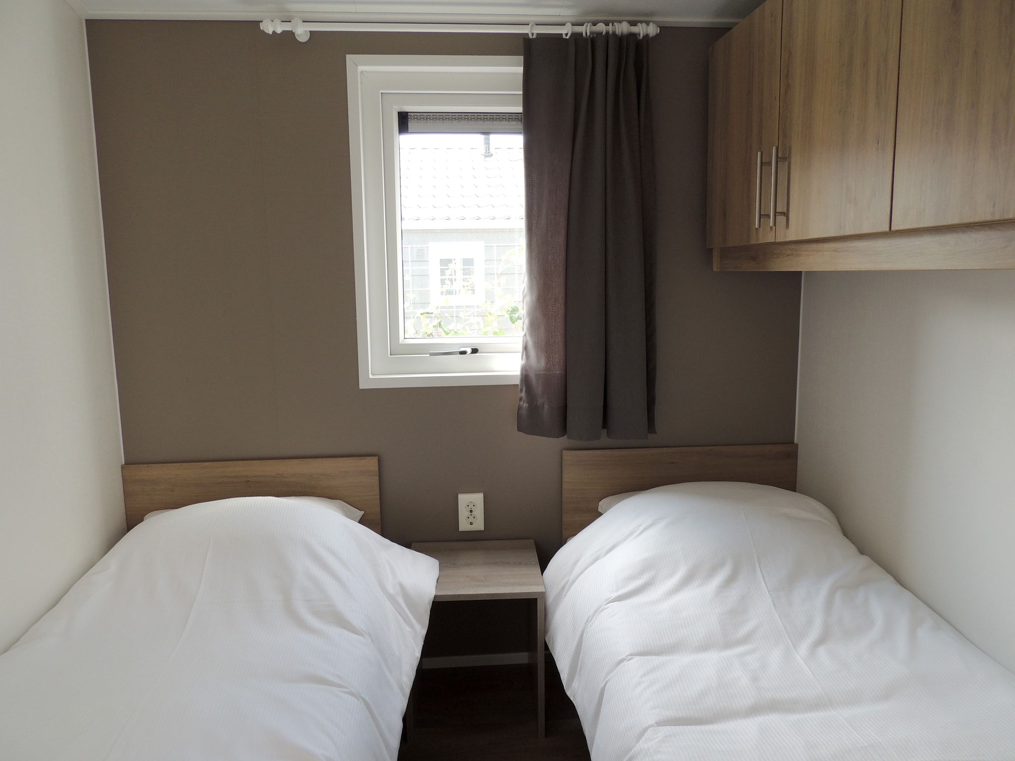 Een slaapkamer van Recreatiepark de Boshoek 20 in Voorthuizen