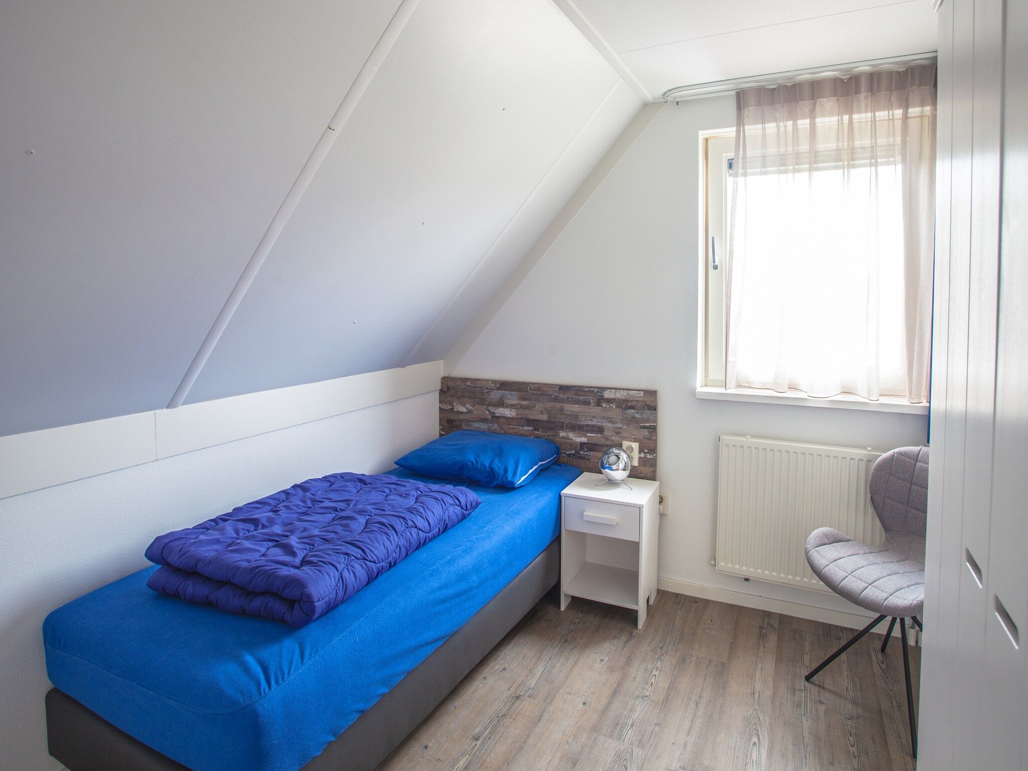 Een slaapkamer van Dijkhuis 6 in Medemblik
