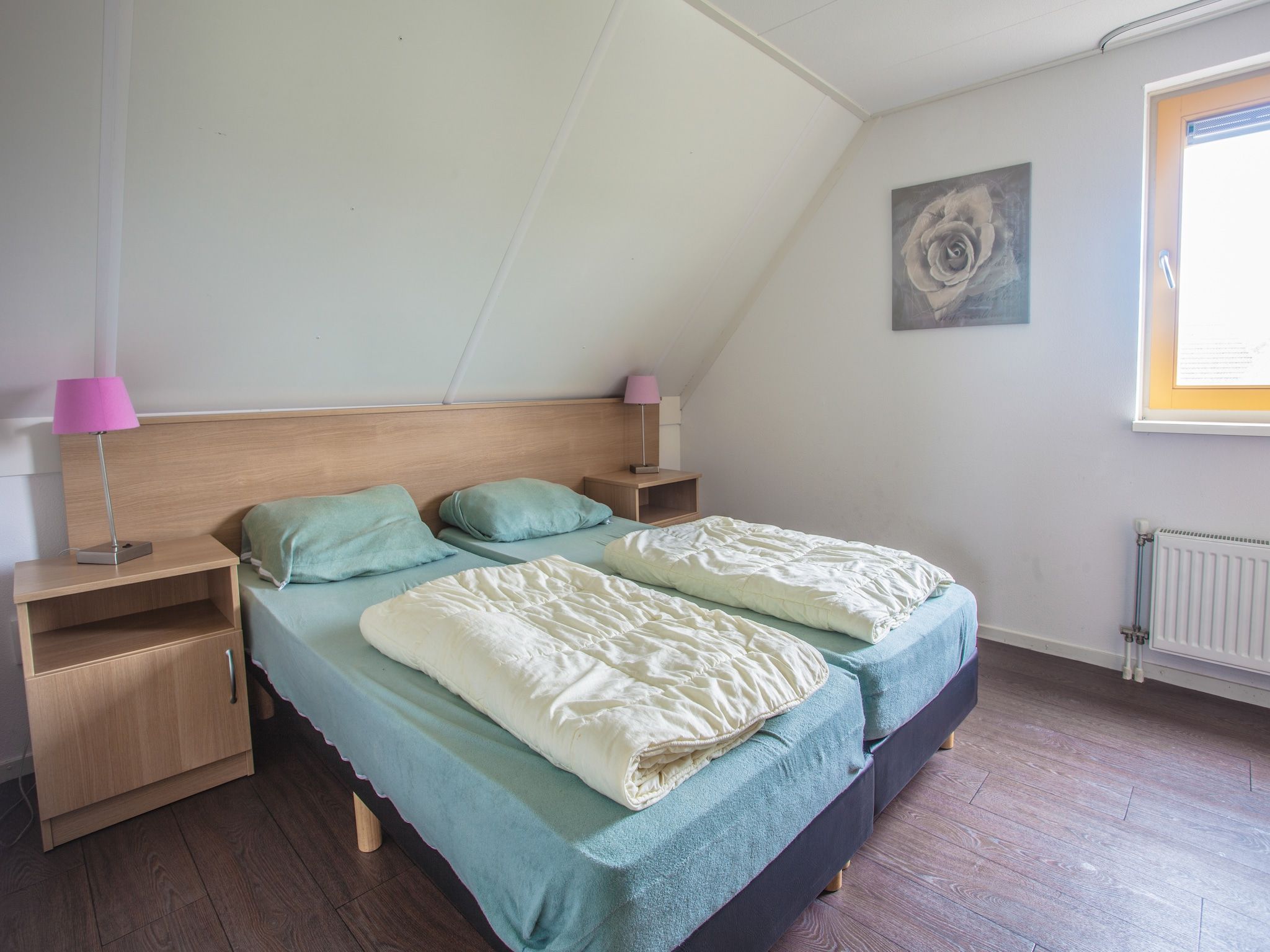 Een slaapkamer van Vlietstroom 6 in Medemblik