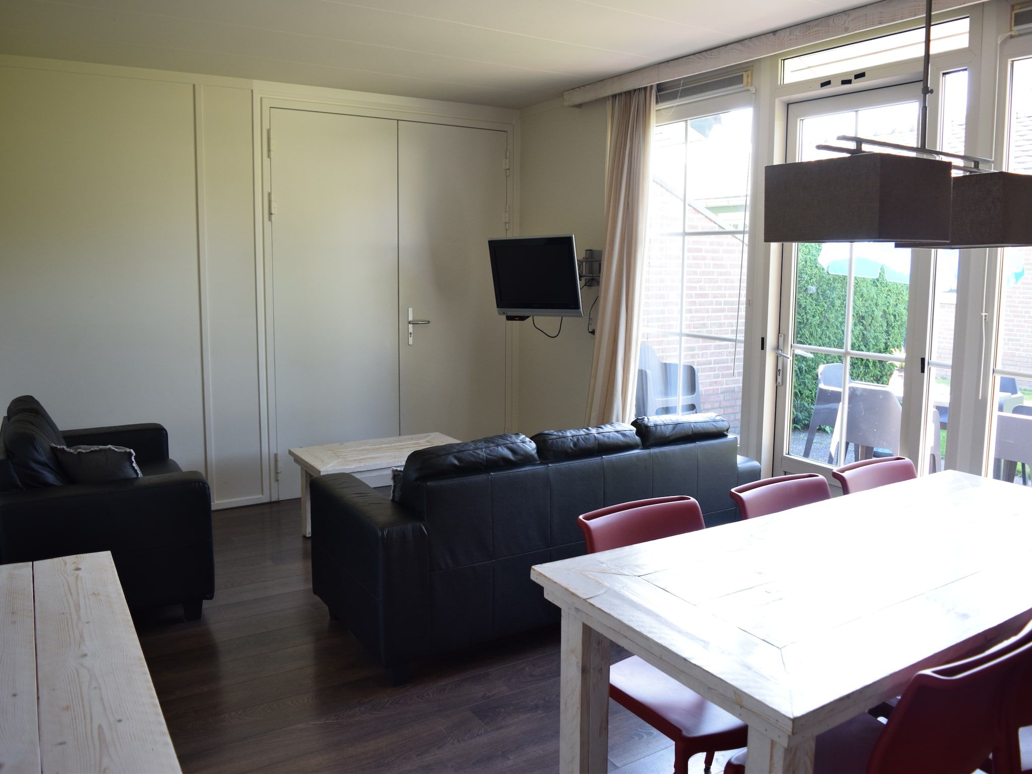 De woonkamer van Recreatiepark de Boshoek 11 in Voorthuizen