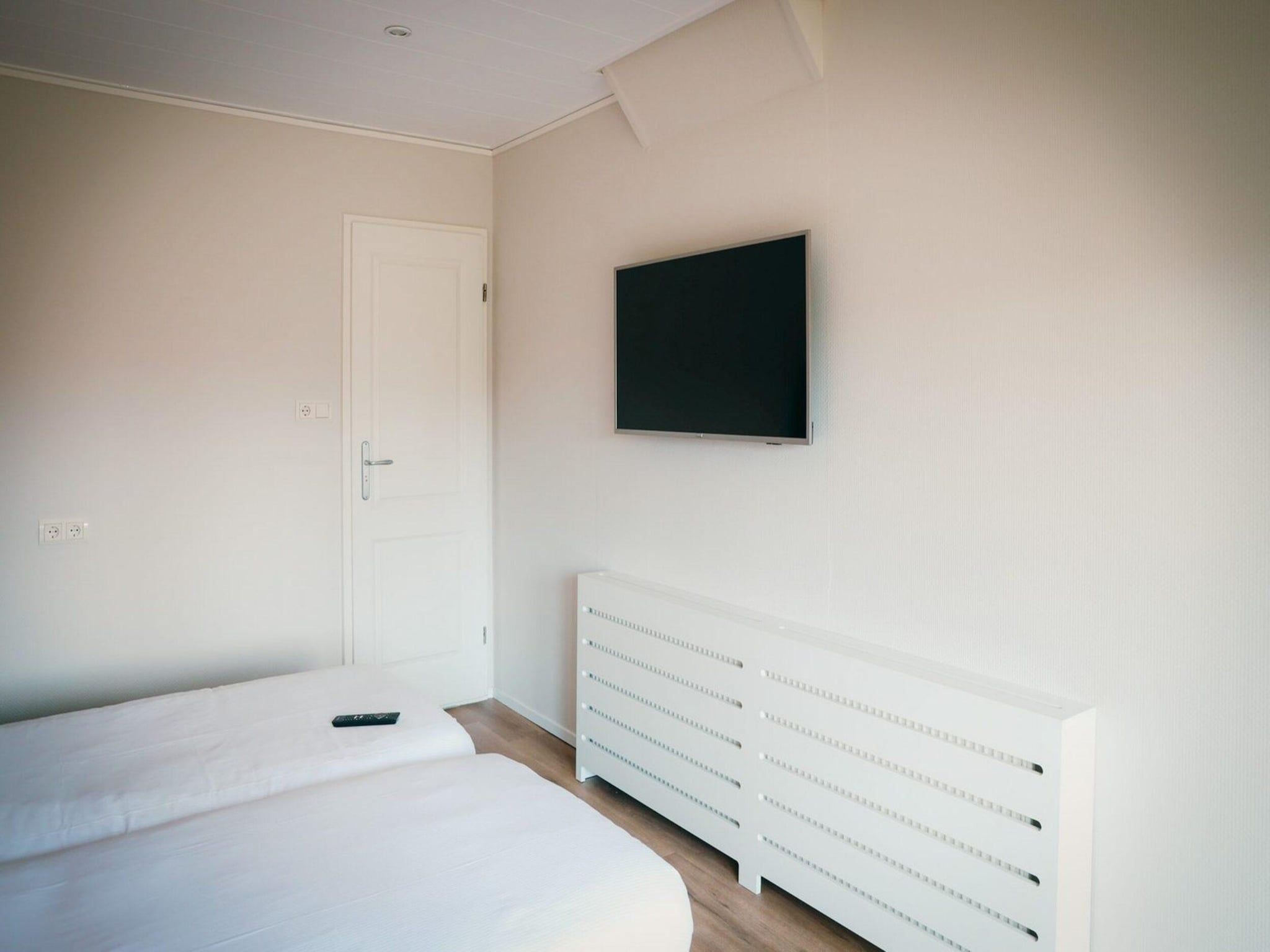 Een slaapkamer van Recreatiepark de Boshoek 16 in Voorthuizen