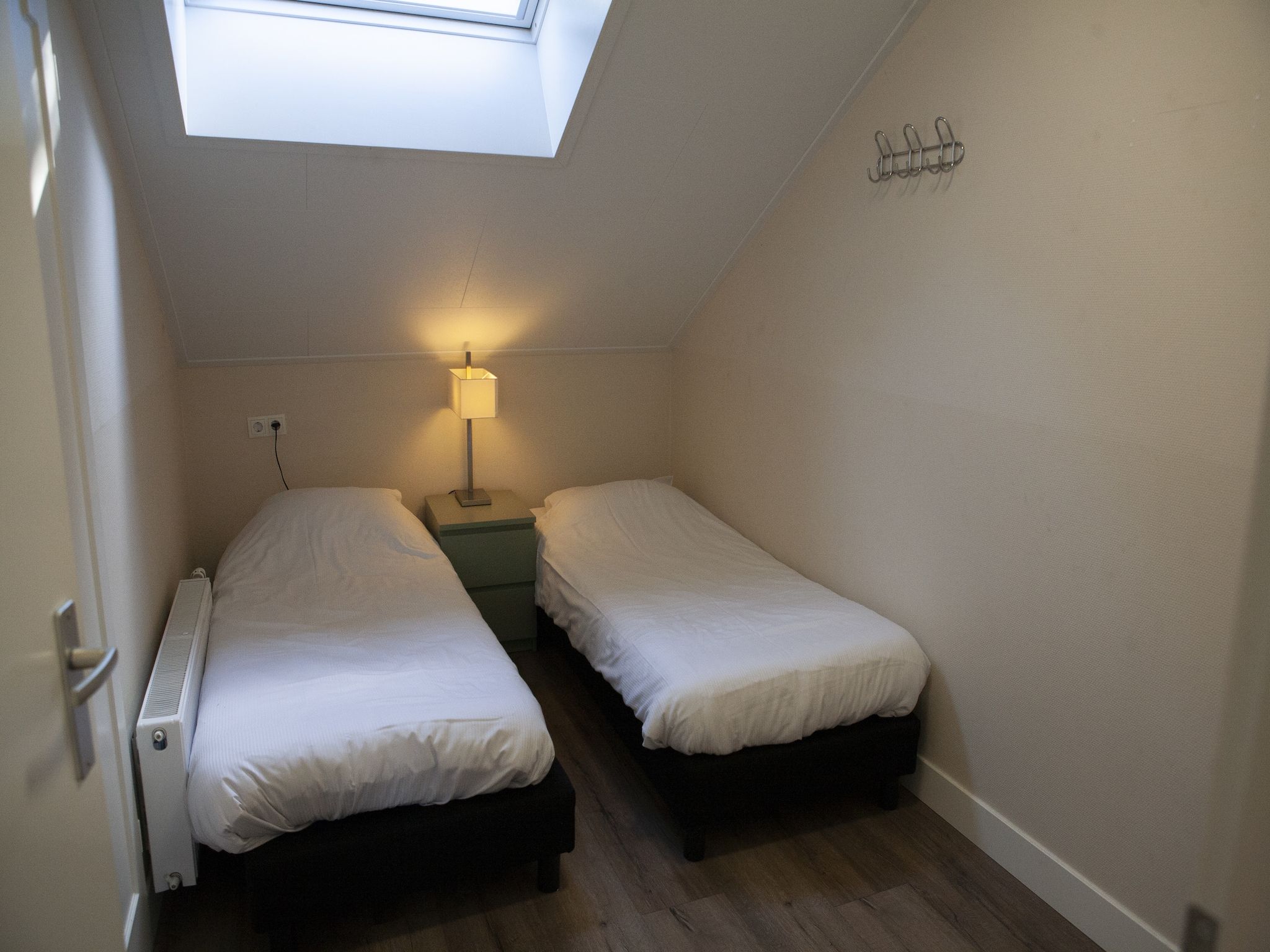 Een slaapkamer van Recreatiepark de Boshoek 18 in Voorthuizen