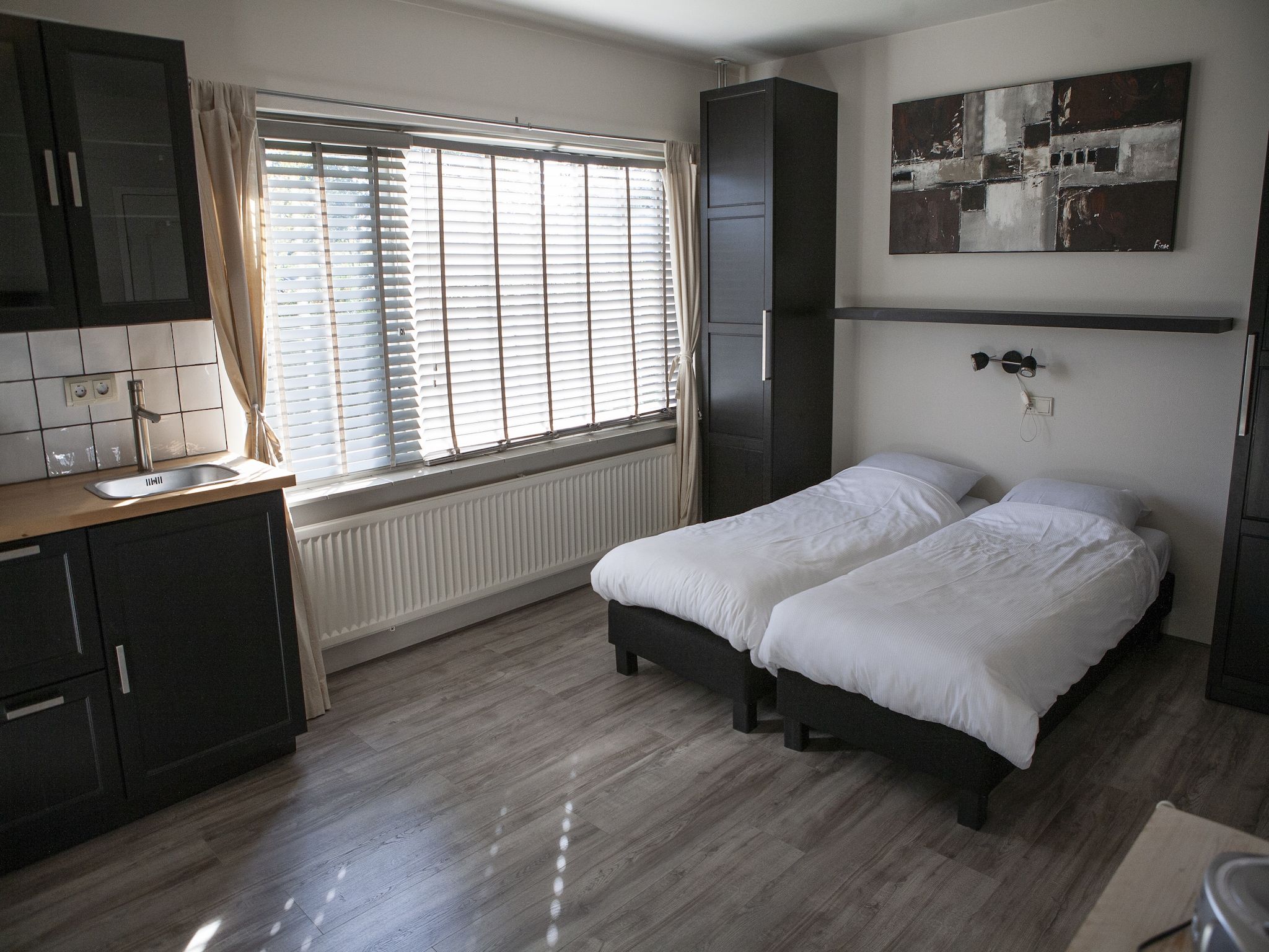 Een slaapkamer van Recreatiepark de Boshoek 18 in Voorthuizen