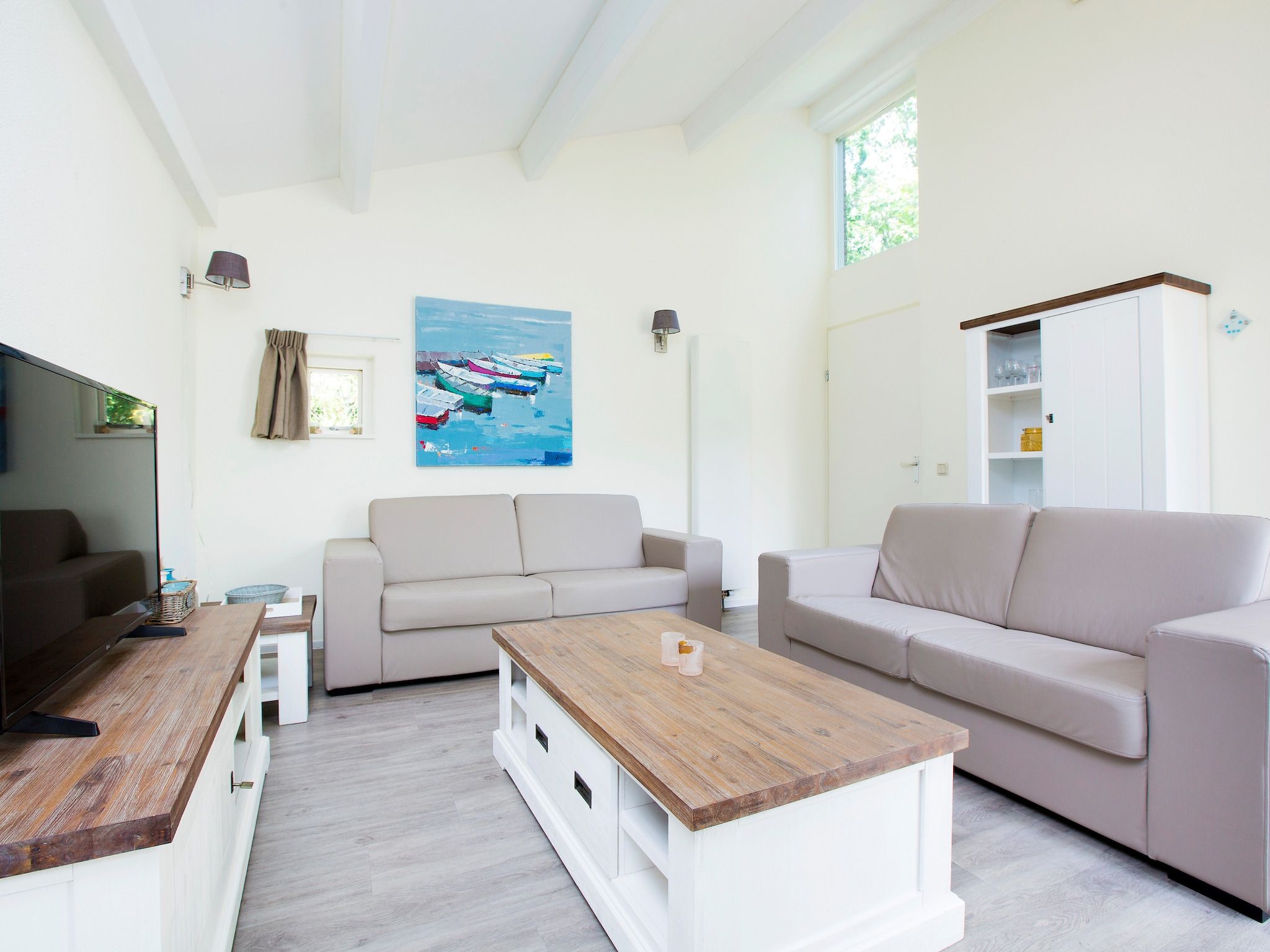 De woonkamer van Vakantiepark Kijkduin 8 in Den Haag