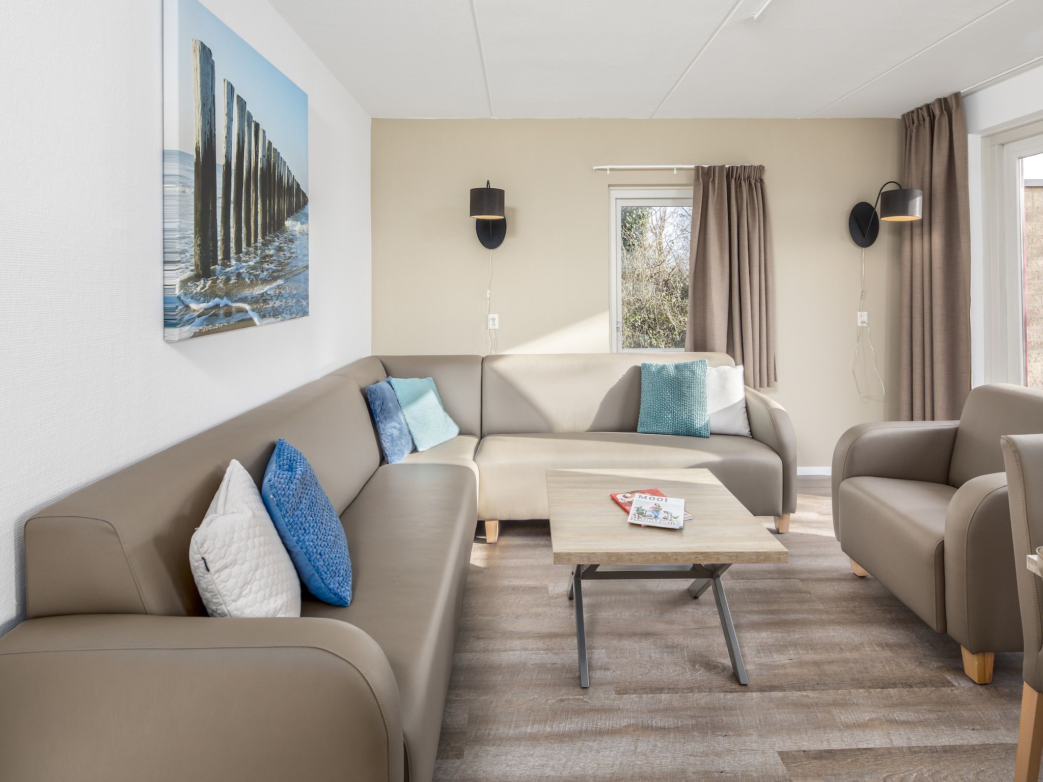 De woonkamer van Vakantiepark de Soeten Haert 16 in Renesse