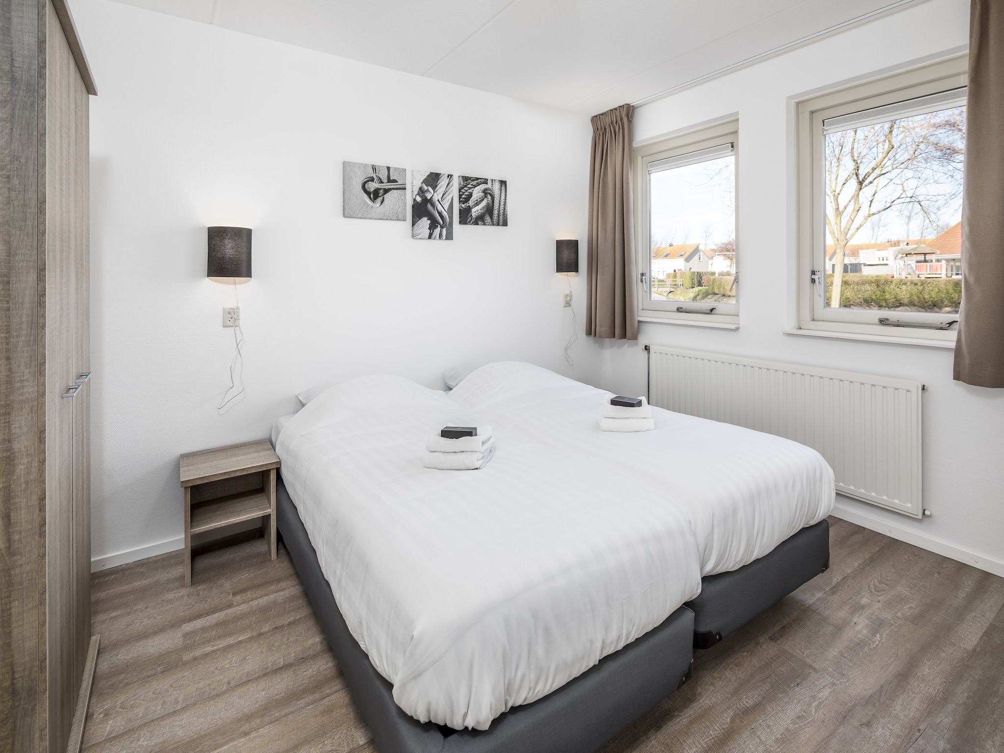 Een slaapkamer van Vakantiepark de Soeten Haert 17 in Renesse