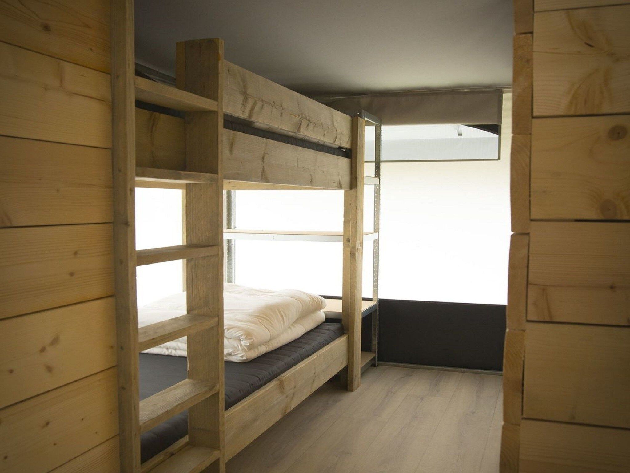 Een slaapkamer van Recreatiepark Duinhoeve 7 in Udenhout