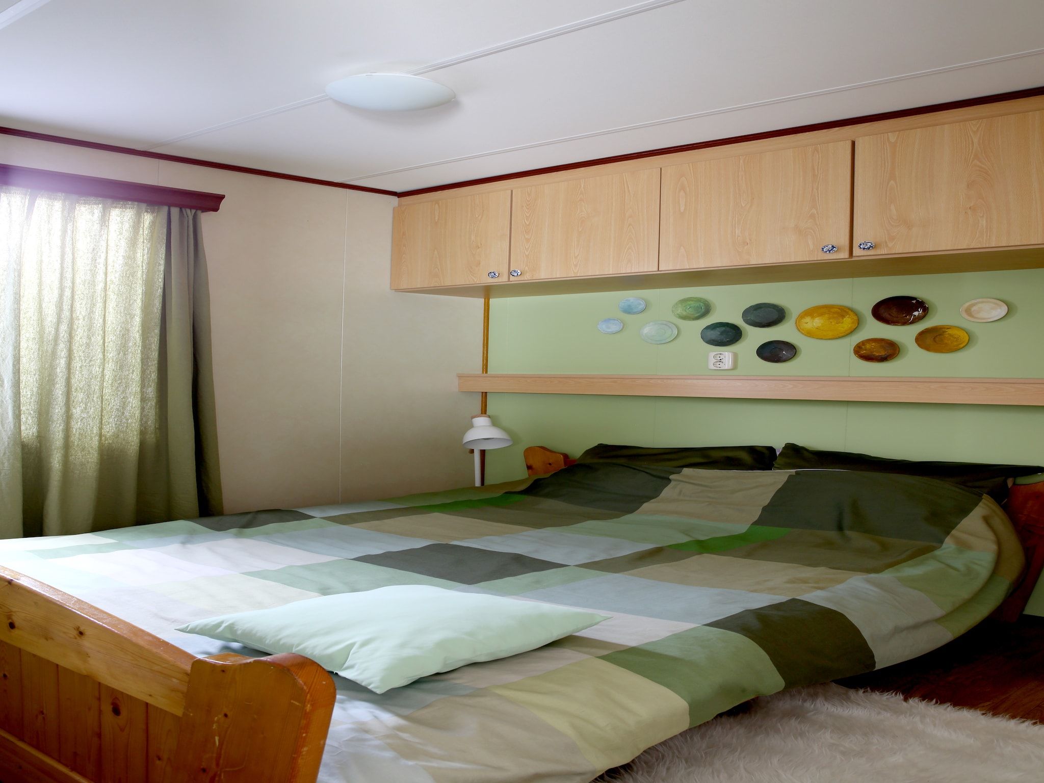 Een slaapkamer van Recreatiepark Duinhoeve 6 in Udenhout