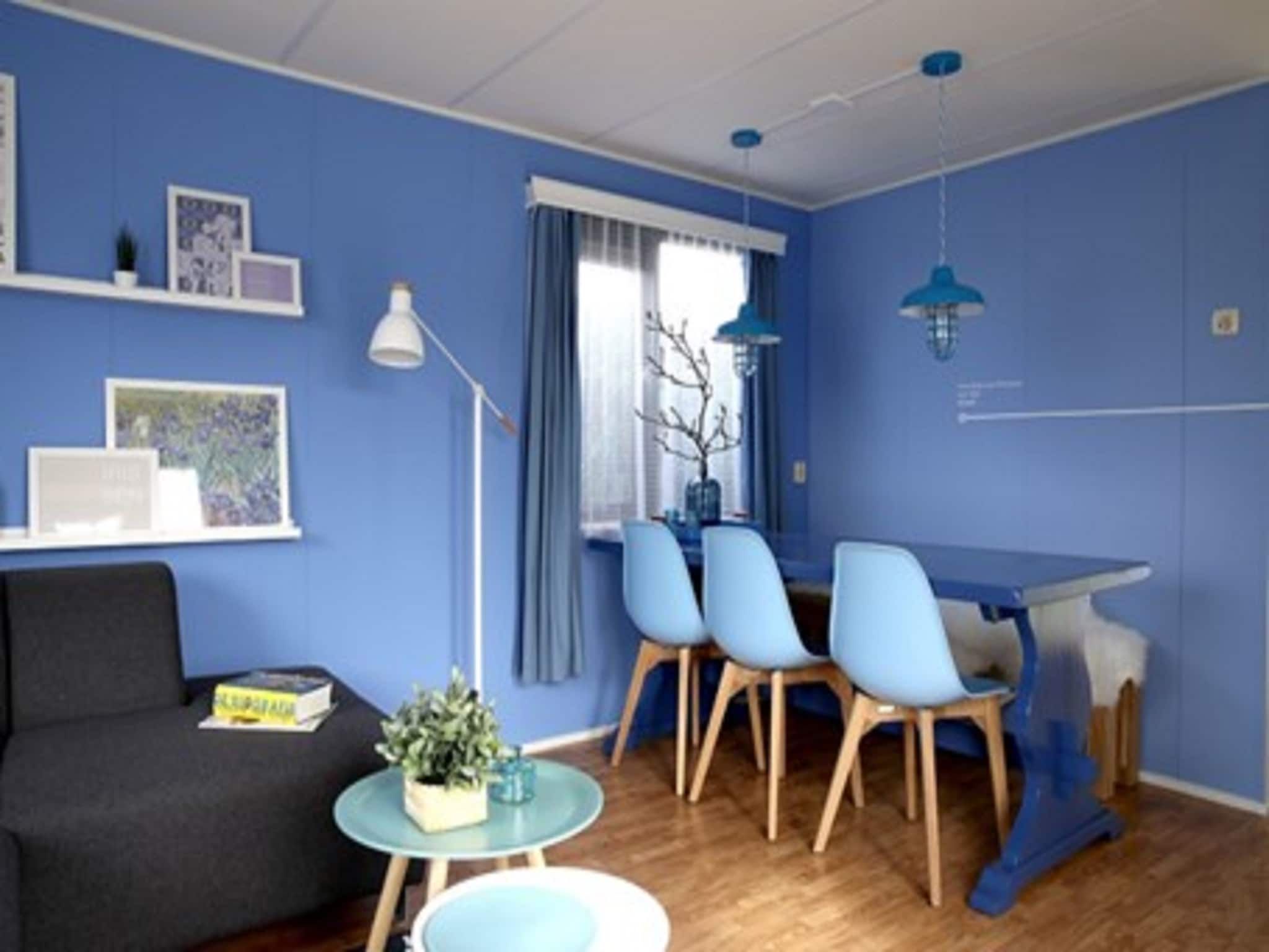 De woonkamer van Recreatiepark Duinhoeve 6 in Udenhout