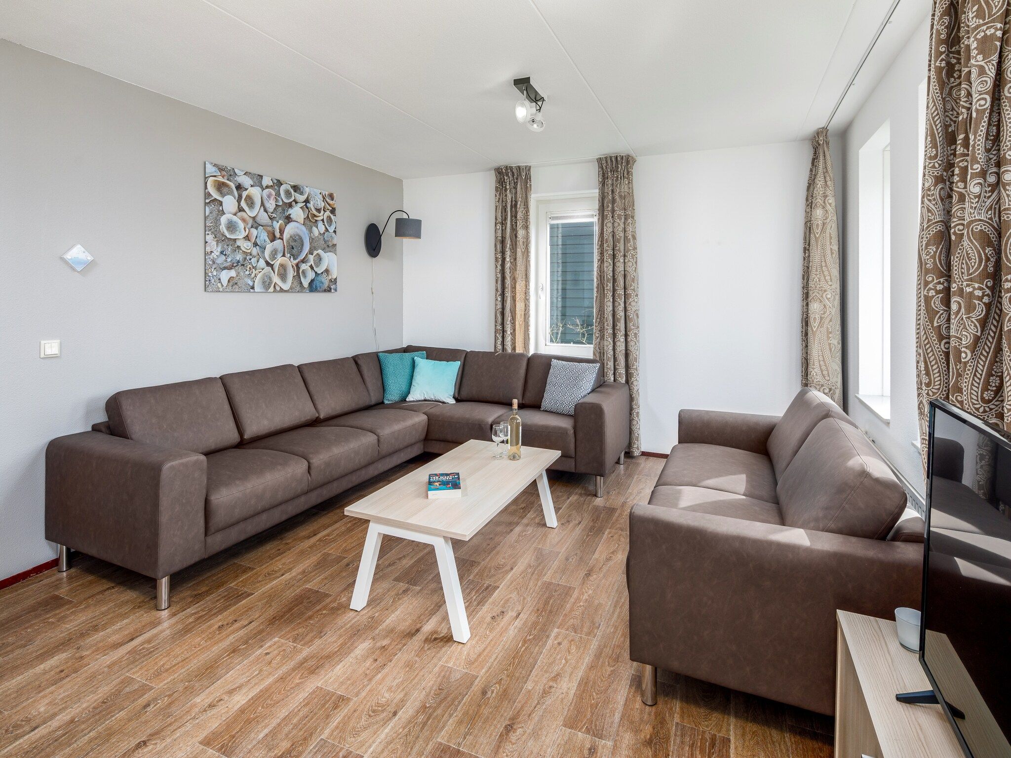 De woonkamer van Aquadelta 33 in Bruinisse