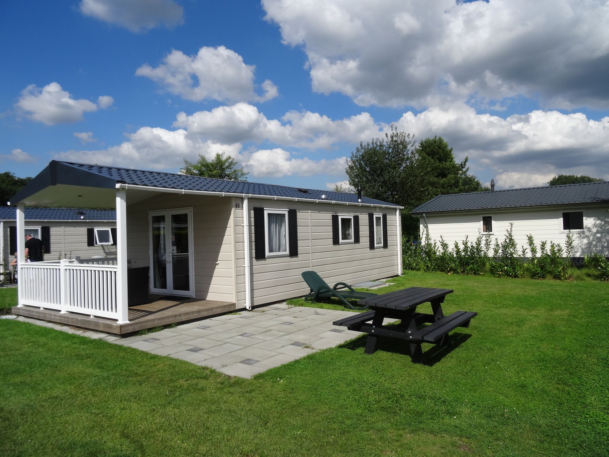 De buitenkant van Recreatiepark Duinhoeve 9 in Udenhout