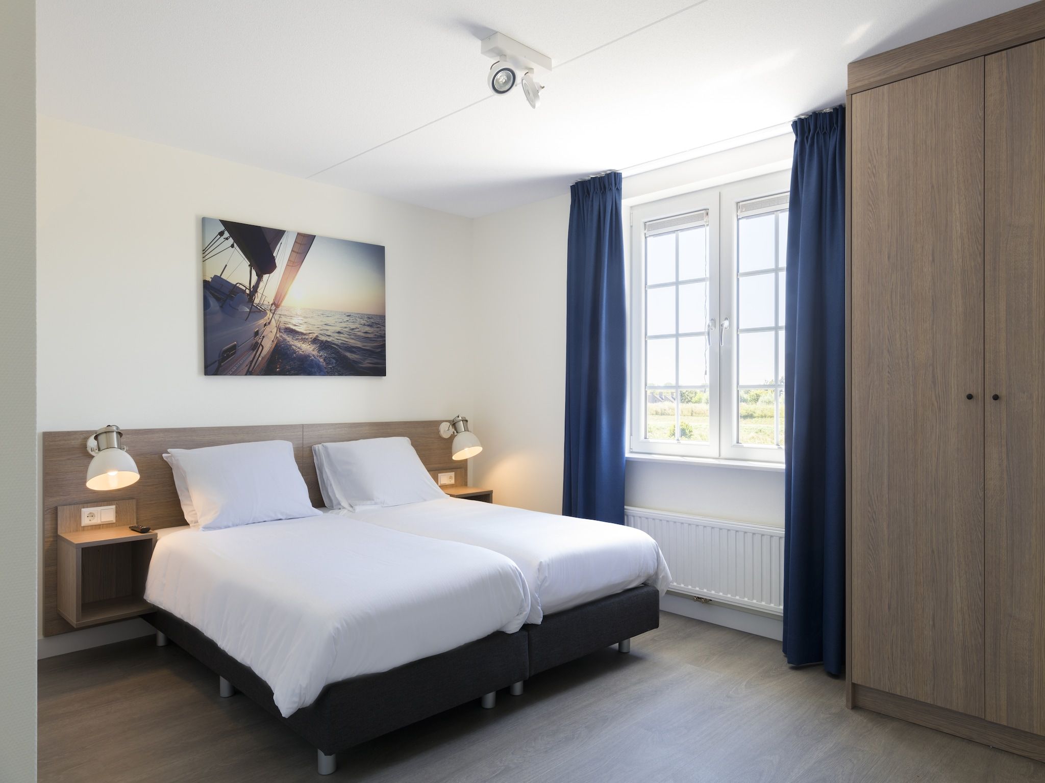 Een slaapkamer van Resort De Parade in Cadzand-Bad