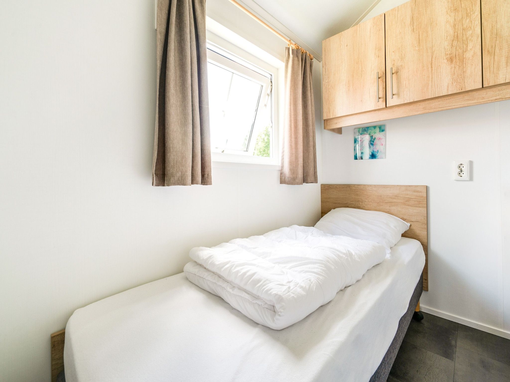 Een slaapkamer van Vakantiepark Eigen Wijze 6 in Bant