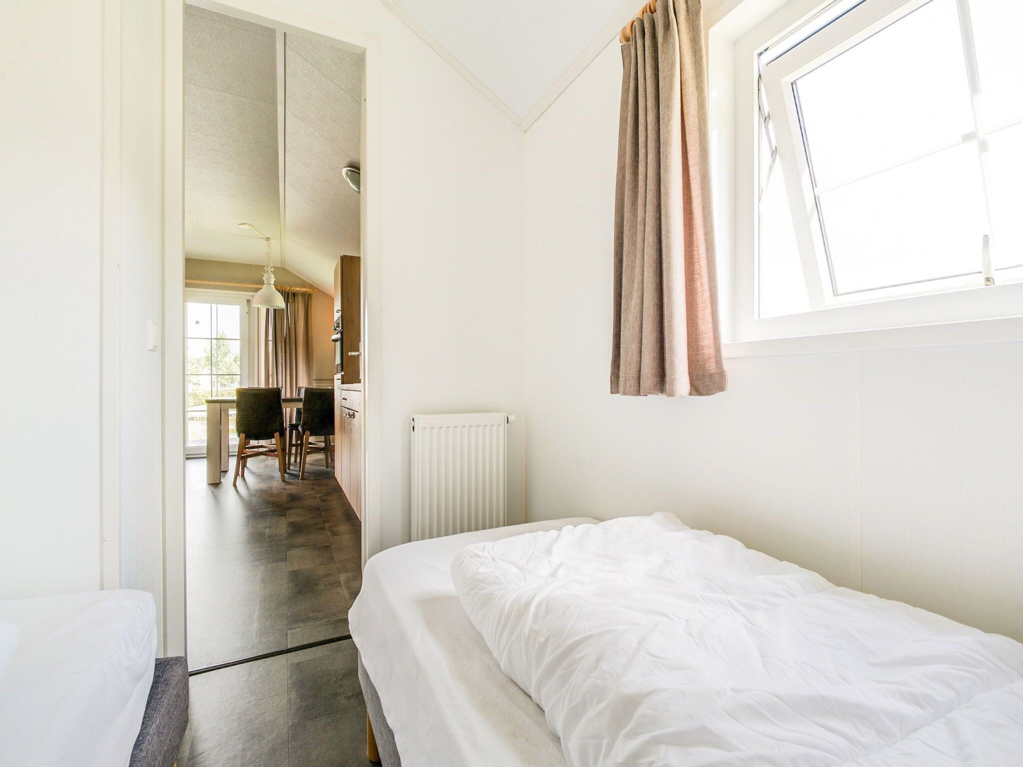 Een slaapkamer van Vakantiepark Eigen Wijze 6 in Bant