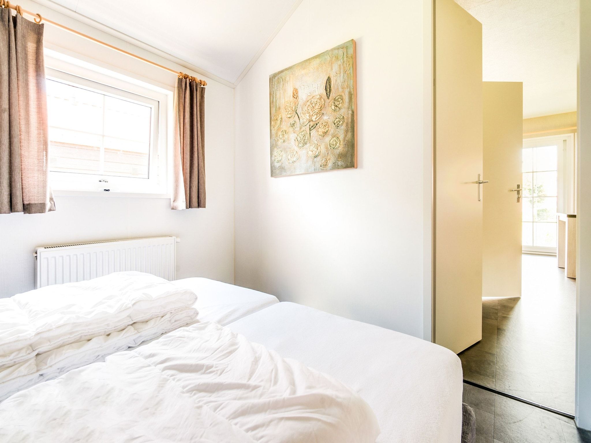 Een slaapkamer van Vakantiepark Eigen Wijze 6 in Bant