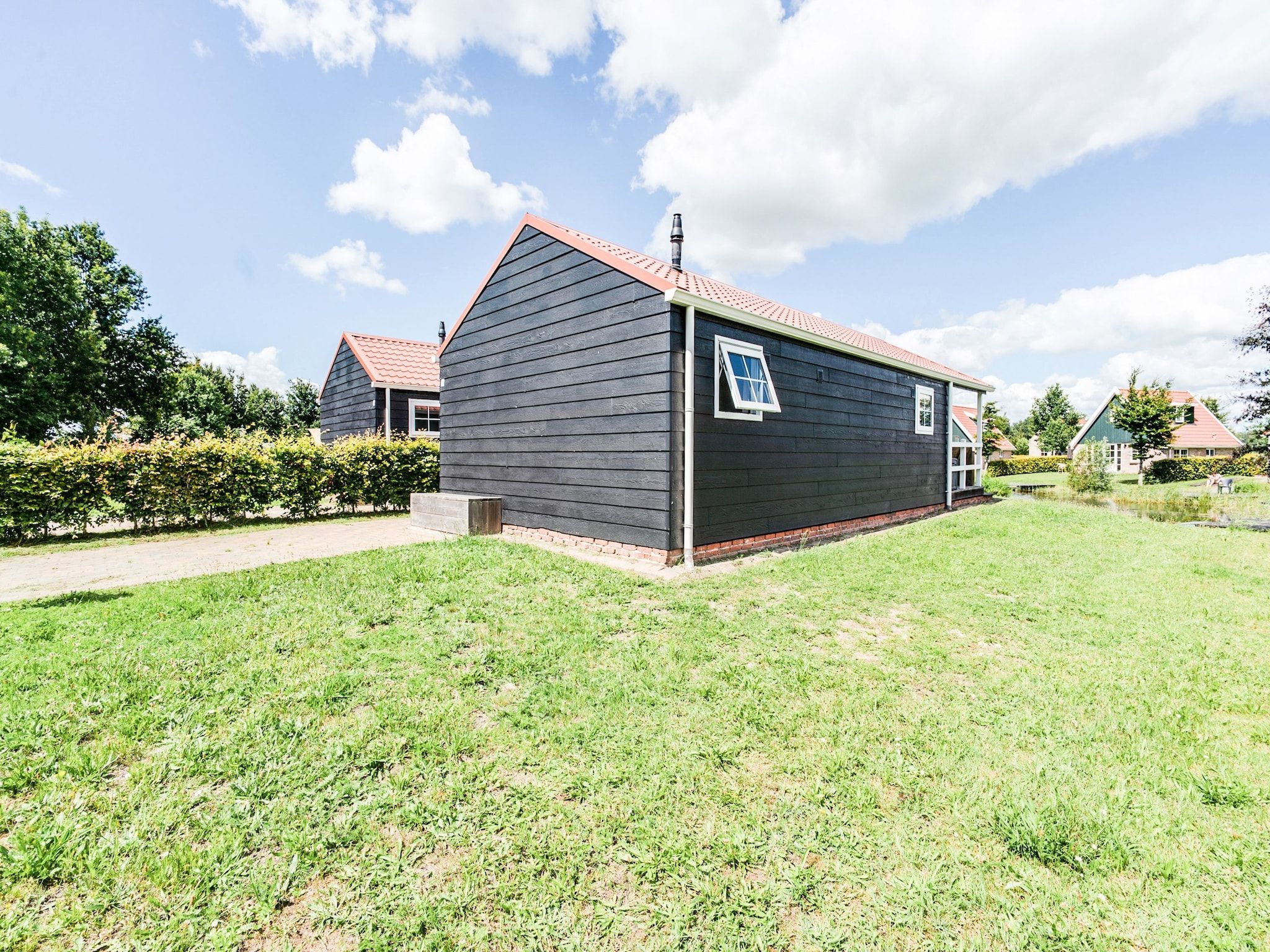 De tuin van Vakantiepark Eigen Wijze 6 in Bant