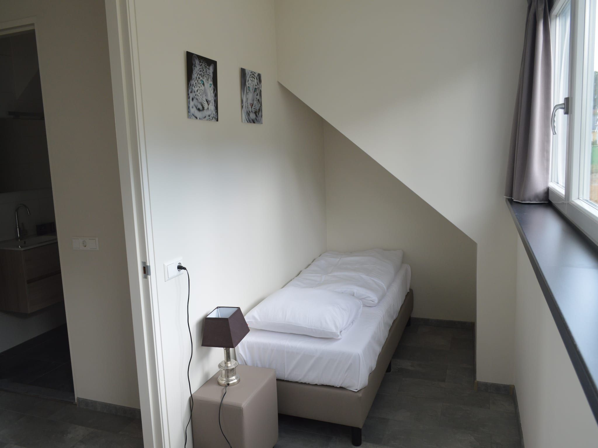 Een slaapkamer van Resort Mooi Bemelen 11 in Bemelen