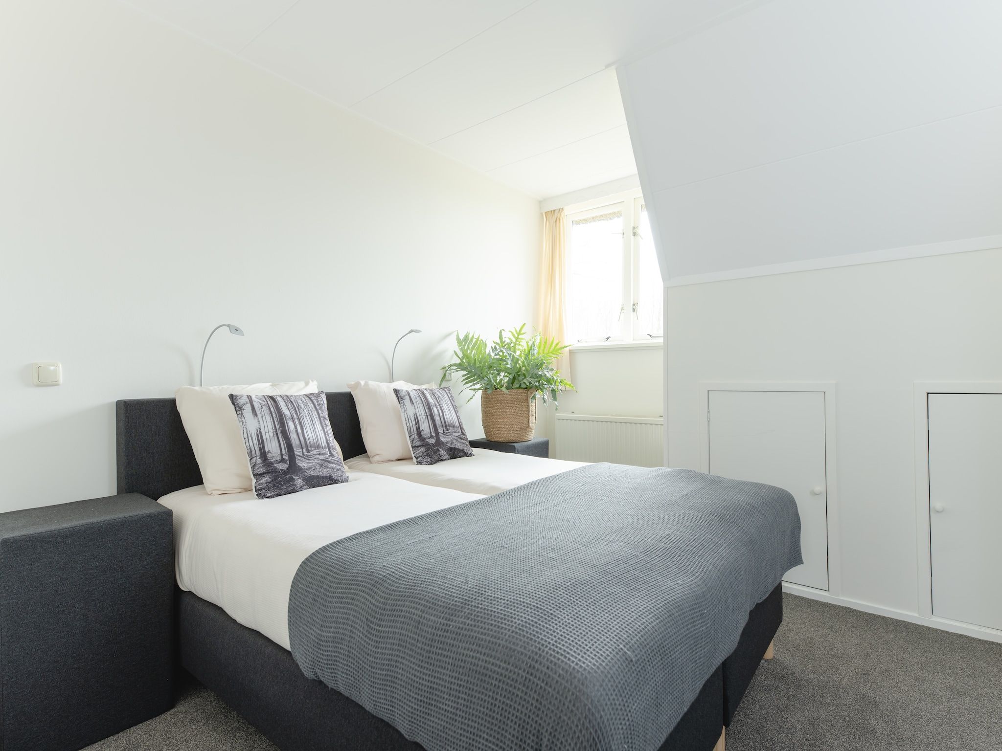 Een slaapkamer van Vakantiepark Mölke 16 in Zuna