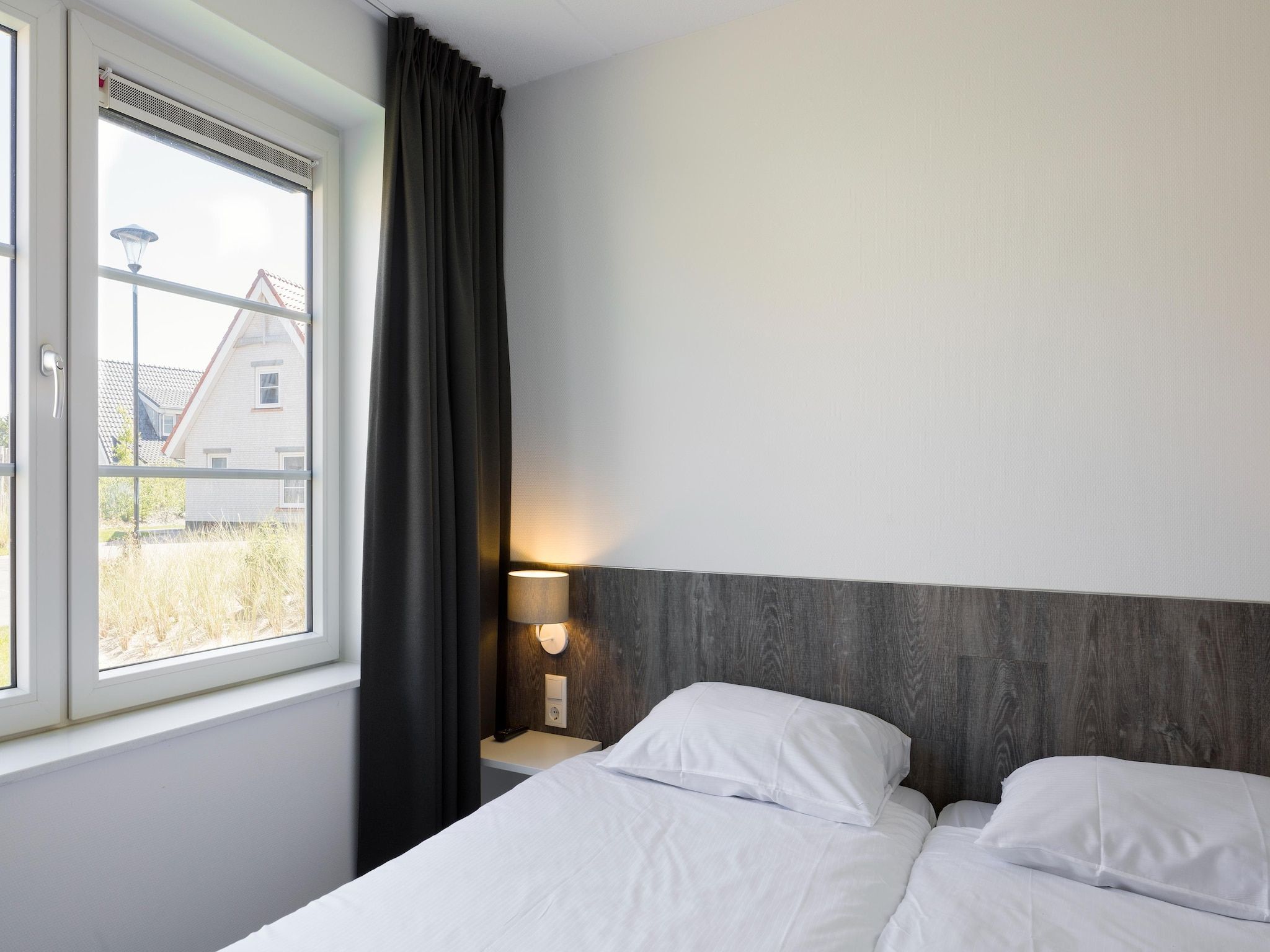 Een slaapkamer van Beach Resort Nieuwvliet-Bad 4 in Nieuwvliet-Bad