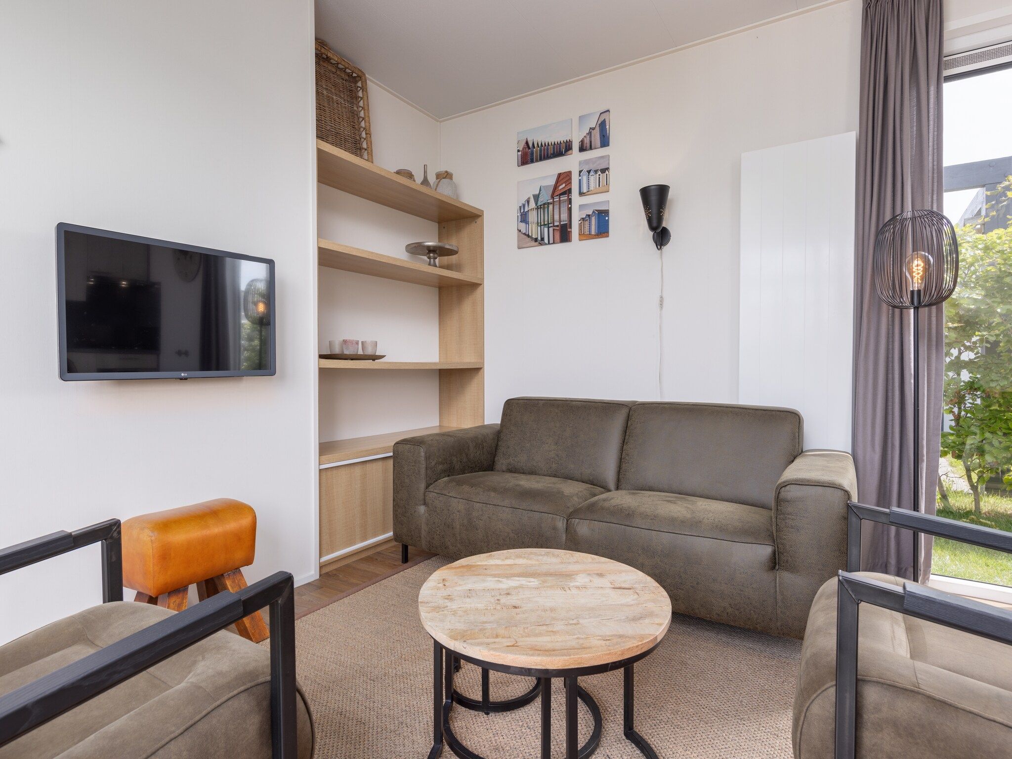 De woonkamer van Vakantiepark Callassande 1 in Callantsoog