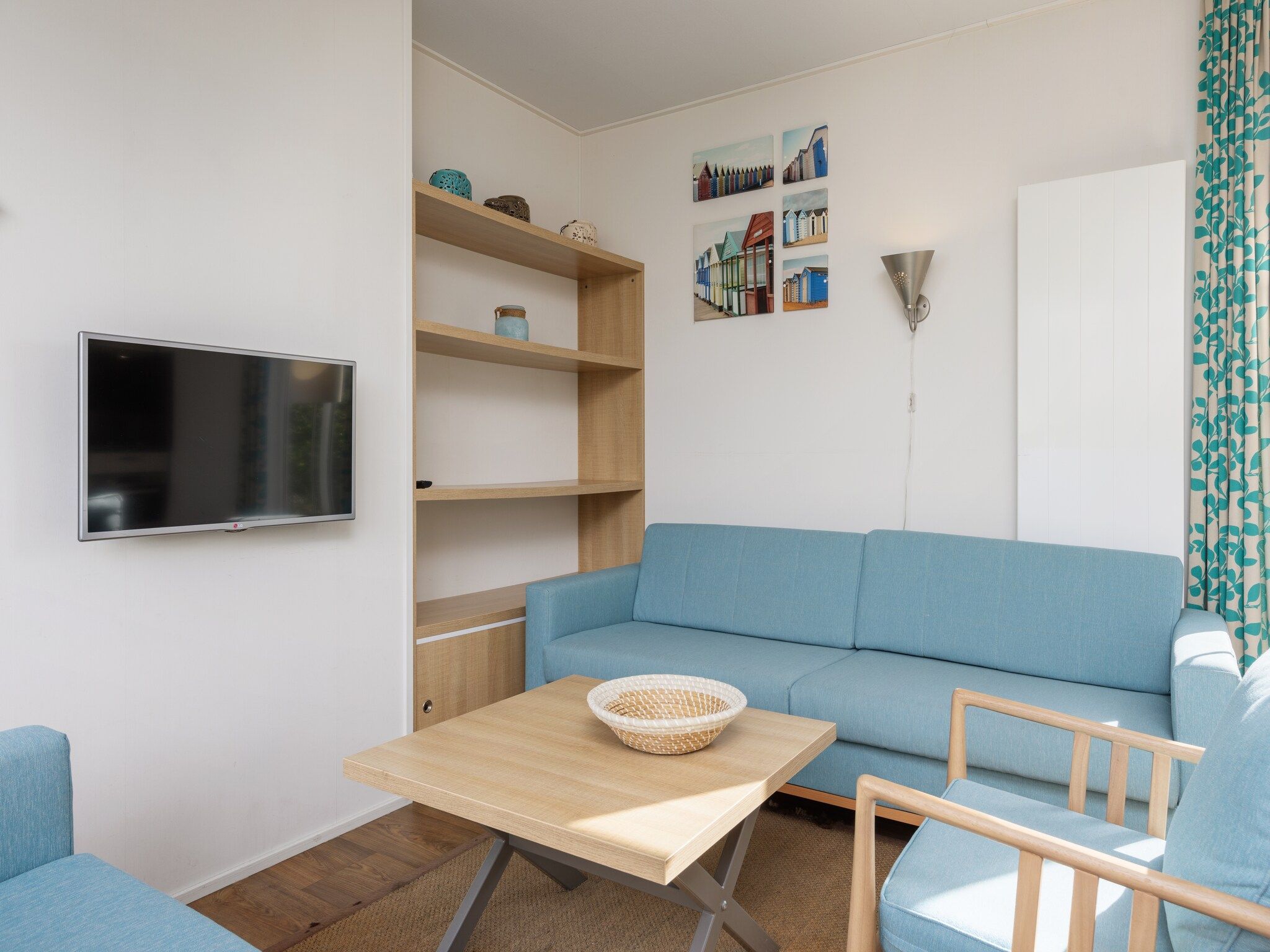 De woonkamer van Vakantiepark Callassande 2 in Callantsoog