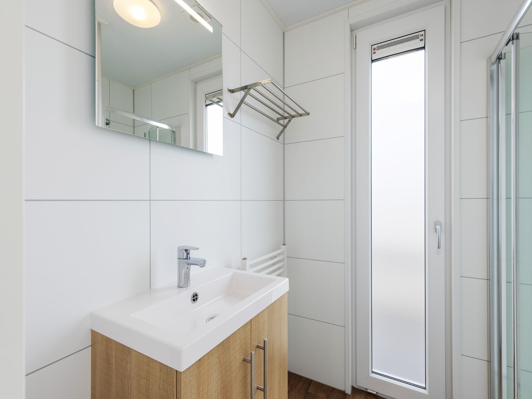 De badkamer van Vakantiepark Callassande 2 in Callantsoog