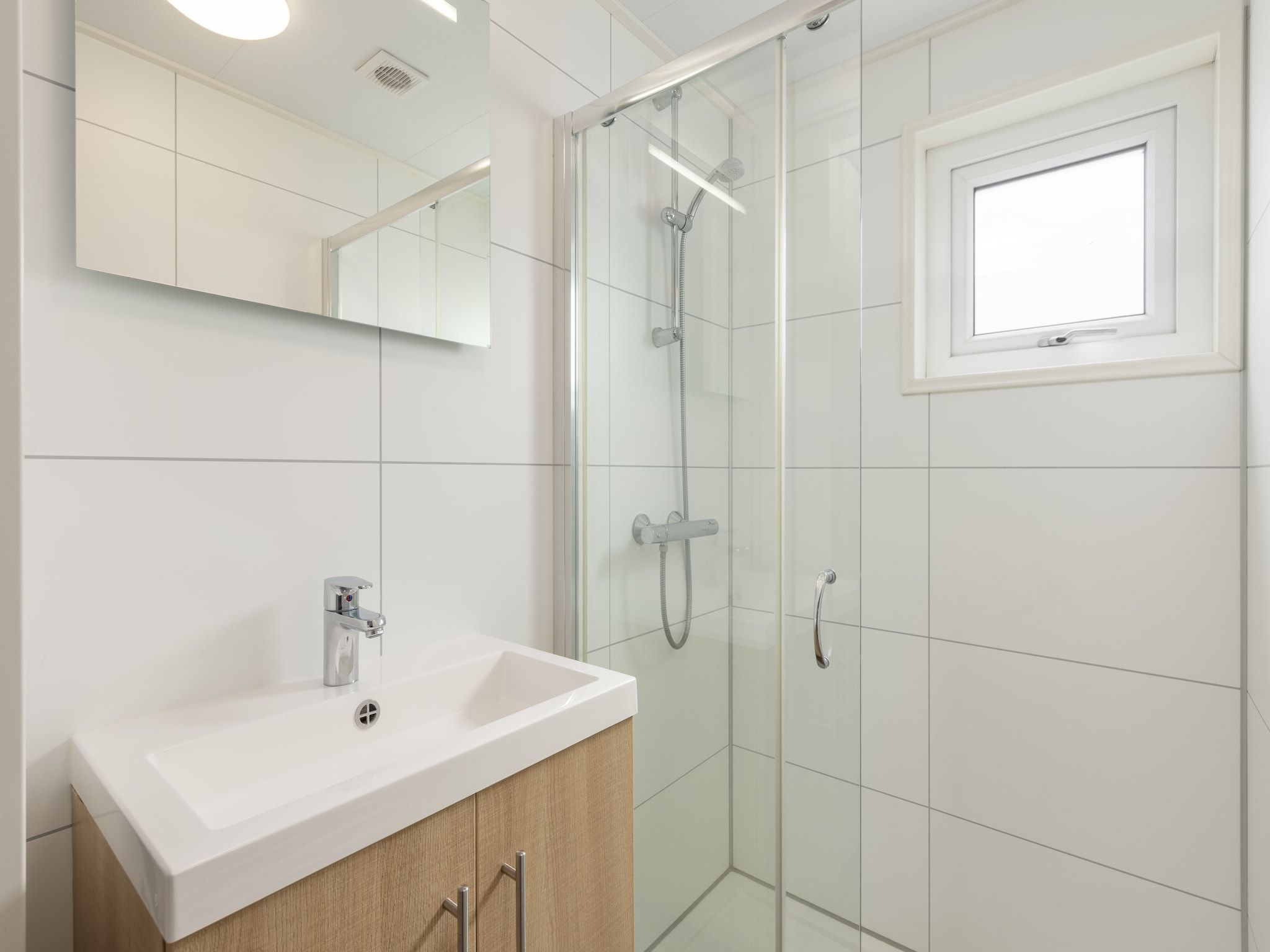 De badkamer van Vakantiepark Callassande 3 in Callantsoog