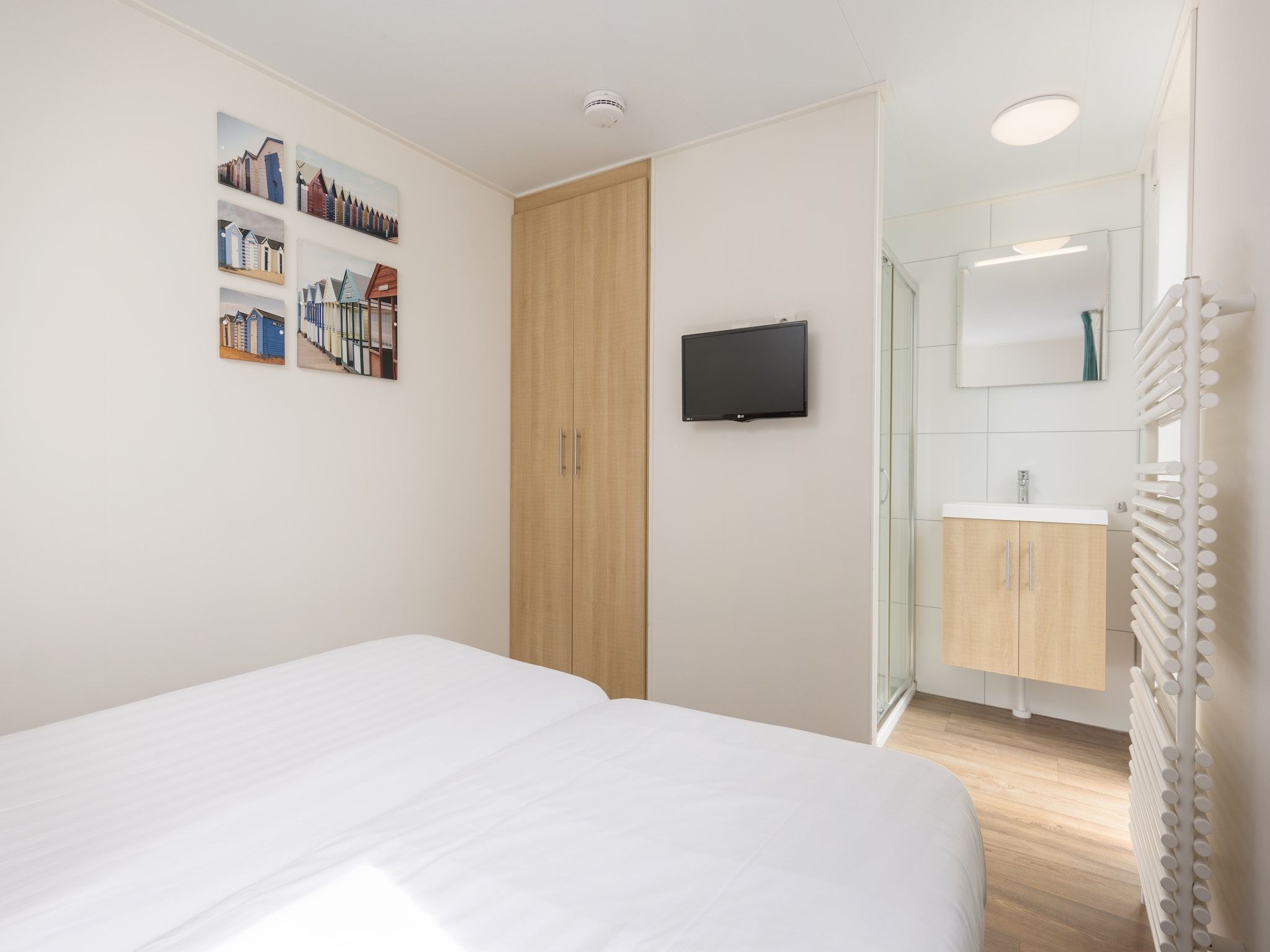 Een slaapkamer van Vakantiepark Callassande 3 in Callantsoog