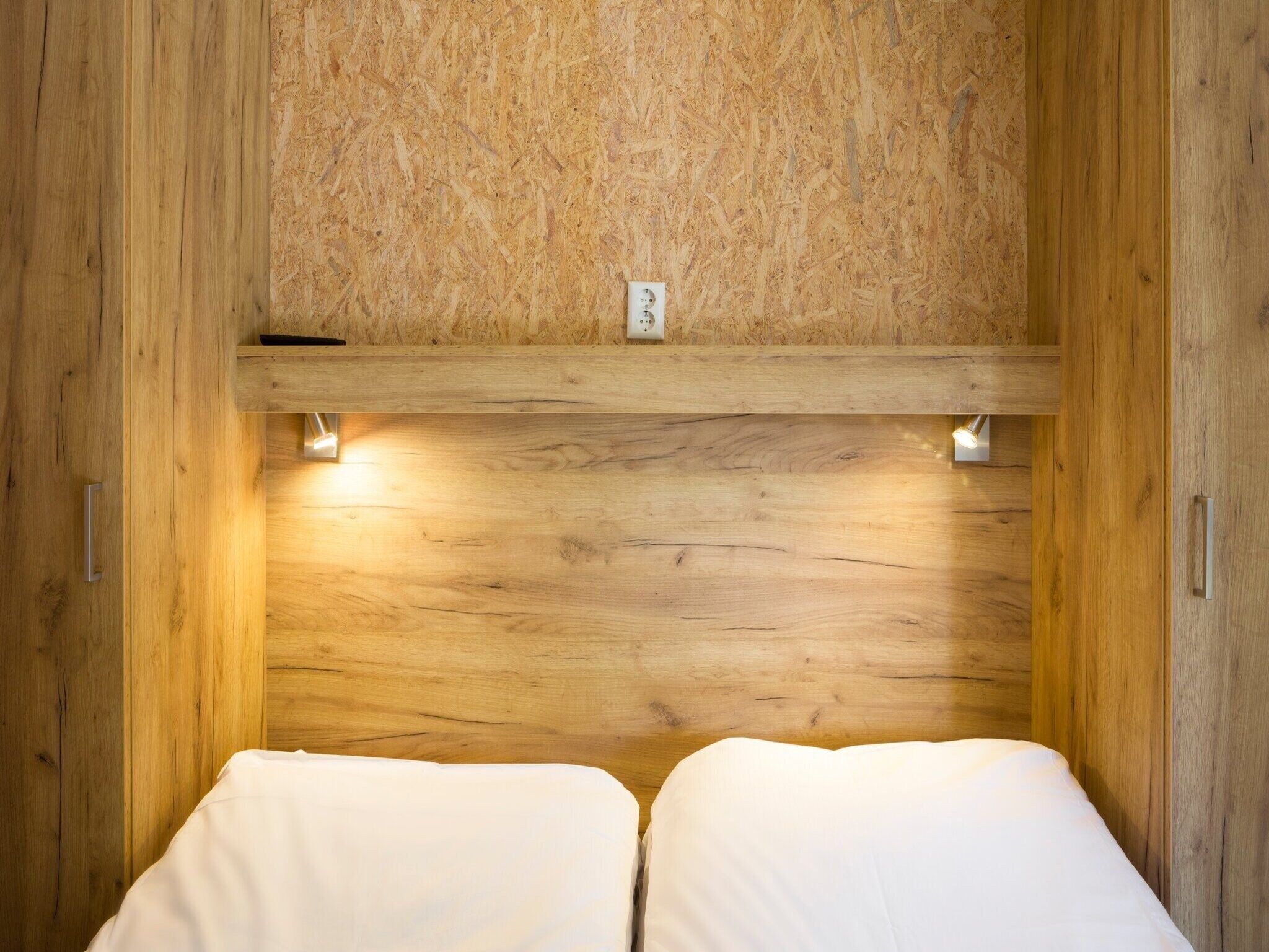 Een slaapkamer van Vakantiepark Beach Resort 7 in Kamperland